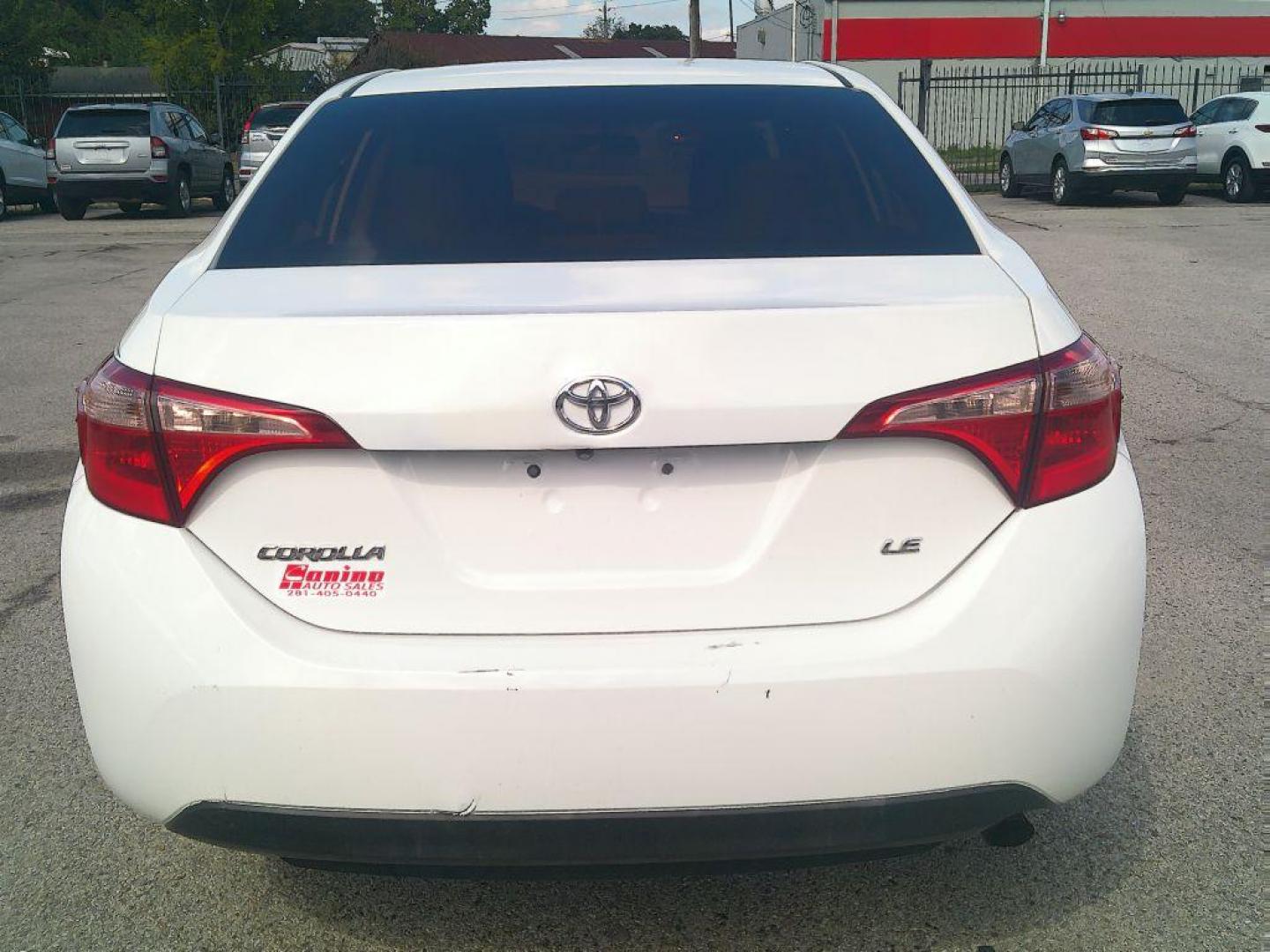 2015 WHITE TOYOTA COROLLA L (5YFBURHE7FP) with an 1.8L engine, Automatic transmission, located at 830 E. Canino Rd., Houston, TX, 77037, (281) 405-0440, 38.358219, -81.729942 - Photo#4