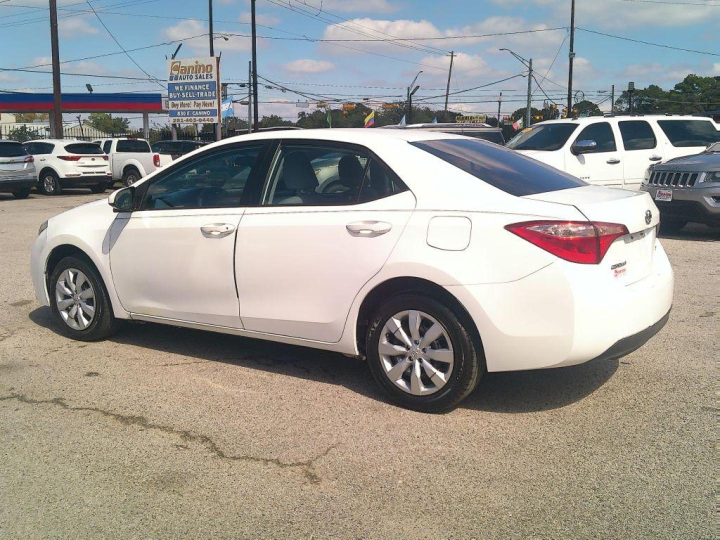 2015 WHITE TOYOTA COROLLA L (5YFBURHE7FP) with an 1.8L engine, Automatic transmission, located at 830 E. Canino Rd., Houston, TX, 77037, (281) 405-0440, 38.358219, -81.729942 - Photo#5