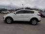 2017 WHITE KIA SPORTAGE LX (KNDPM3AC4H7) with an 2.4L engine, Automatic transmission, located at 830 E. Canino Rd., Houston, TX, 77037, (281) 405-0440, 38.358219, -81.729942 - Photo#6