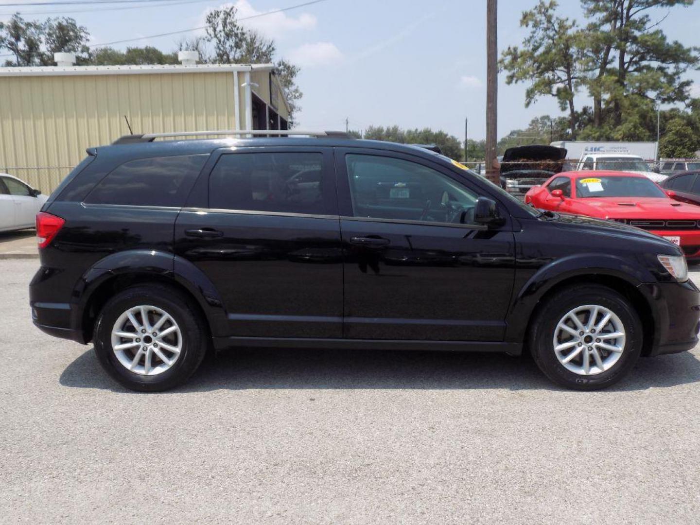 2018 BLACK DODGE JOURNEY SXT (3C4PDCBB8JT) with an 2.4L engine, Automatic transmission, located at 830 E. Canino Rd., Houston, TX, 77037, (281) 405-0440, 38.358219, -81.729942 - Photo#1