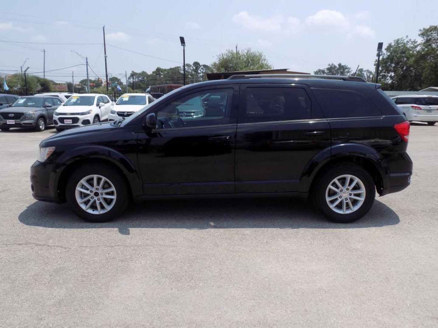 2018 BLACK DODGE JOURNEY SXT (3C4PDCBB8JT) with an 2.4L engine, Automatic transmission, located at 830 E. Canino Rd., Houston, TX, 77037, (281) 405-0440, 38.358219, -81.729942 - Photo#3