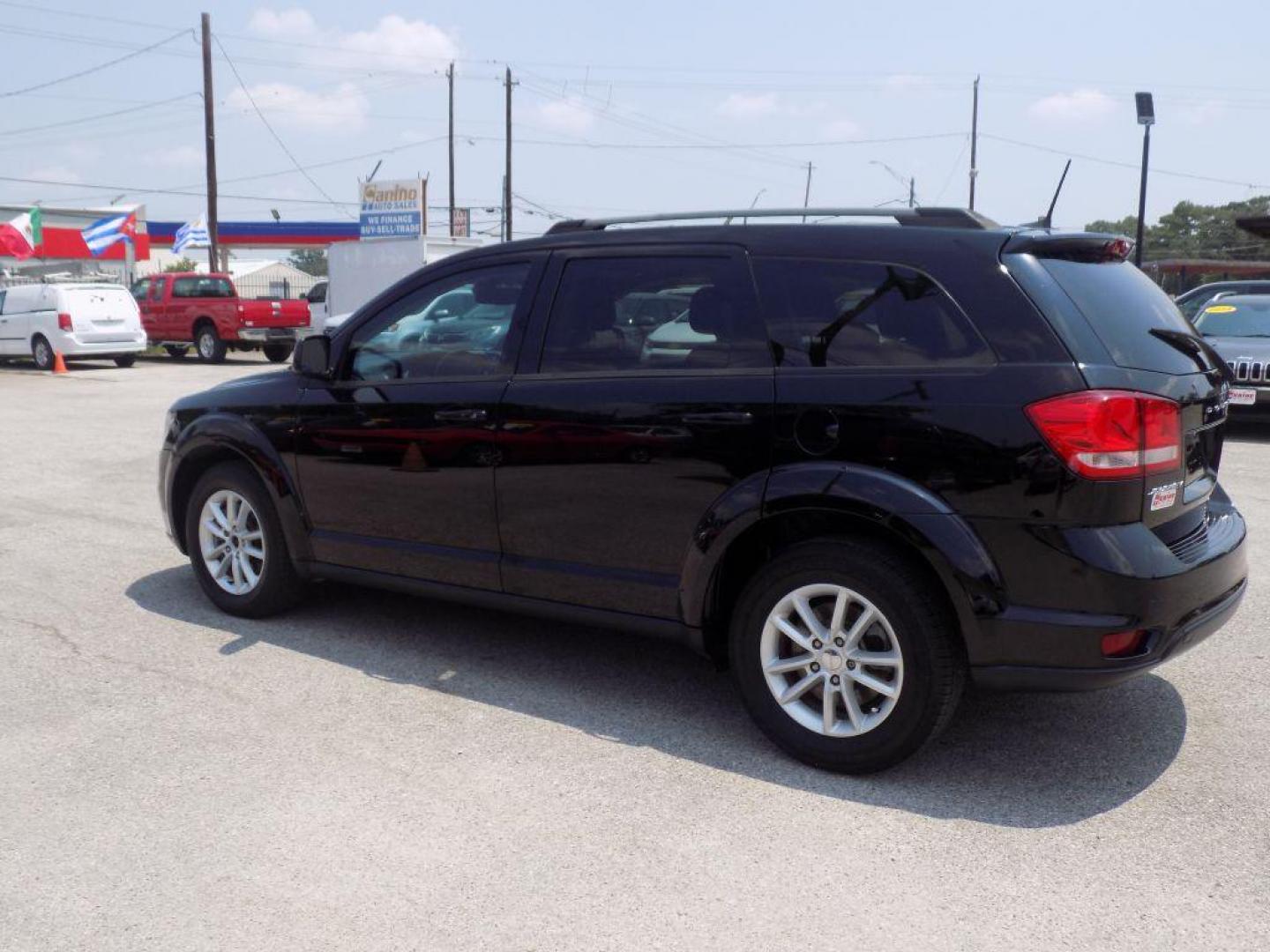 2018 BLACK DODGE JOURNEY SXT (3C4PDCBB8JT) with an 2.4L engine, Automatic transmission, located at 830 E. Canino Rd., Houston, TX, 77037, (281) 405-0440, 38.358219, -81.729942 - Photo#4