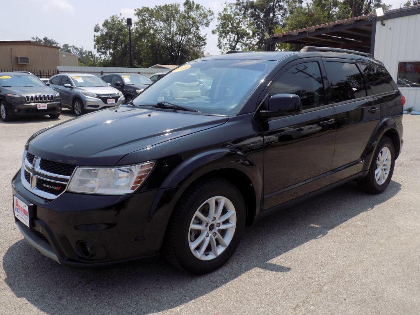 2018 BLACK DODGE JOURNEY SXT (3C4PDCBB8JT) with an 2.4L engine, Automatic transmission, located at 830 E. Canino Rd., Houston, TX, 77037, (281) 405-0440, 38.358219, -81.729942 - Photo#5