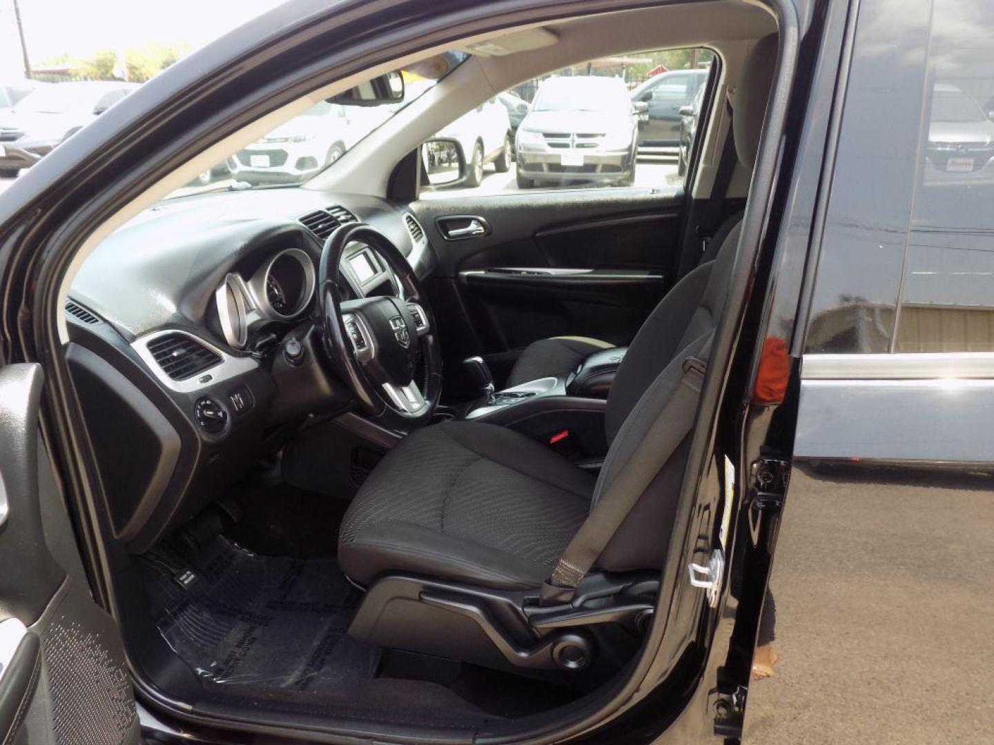 2018 BLACK DODGE JOURNEY SXT (3C4PDCBB8JT) with an 2.4L engine, Automatic transmission, located at 830 E. Canino Rd., Houston, TX, 77037, (281) 405-0440, 38.358219, -81.729942 - Photo#16