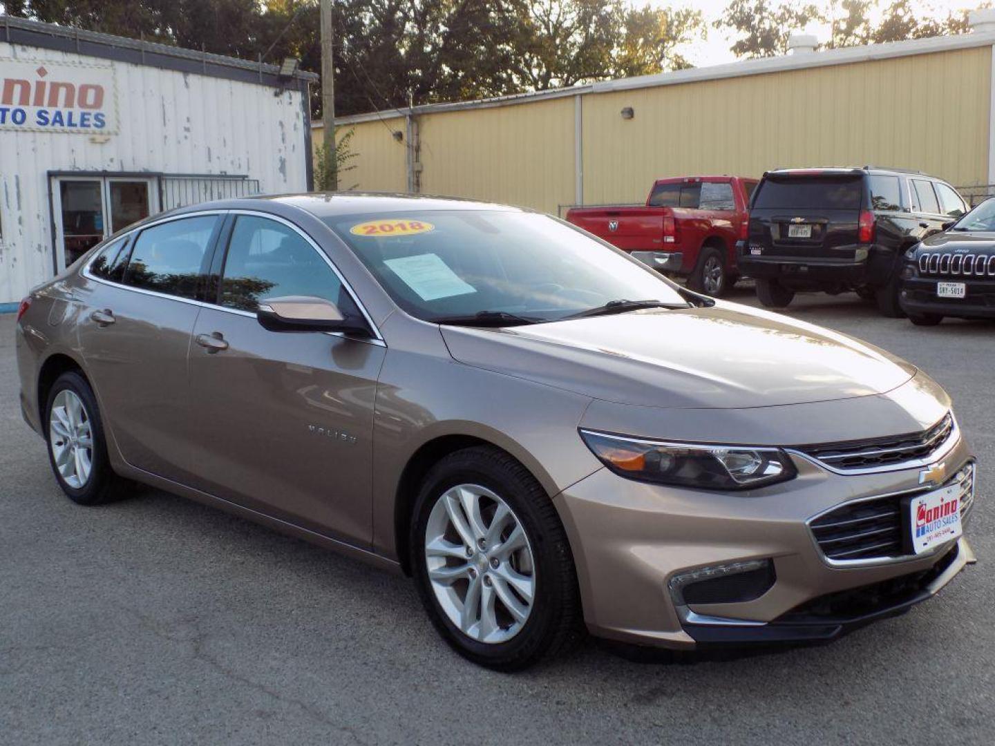 2018 GOLD CHEVROLET MALIBU LT (1G1ZD5ST3JF) with an 1.5L engine, Automatic transmission, located at 830 E. Canino Rd., Houston, TX, 77037, (281) 405-0440, 38.358219, -81.729942 - Photo#1