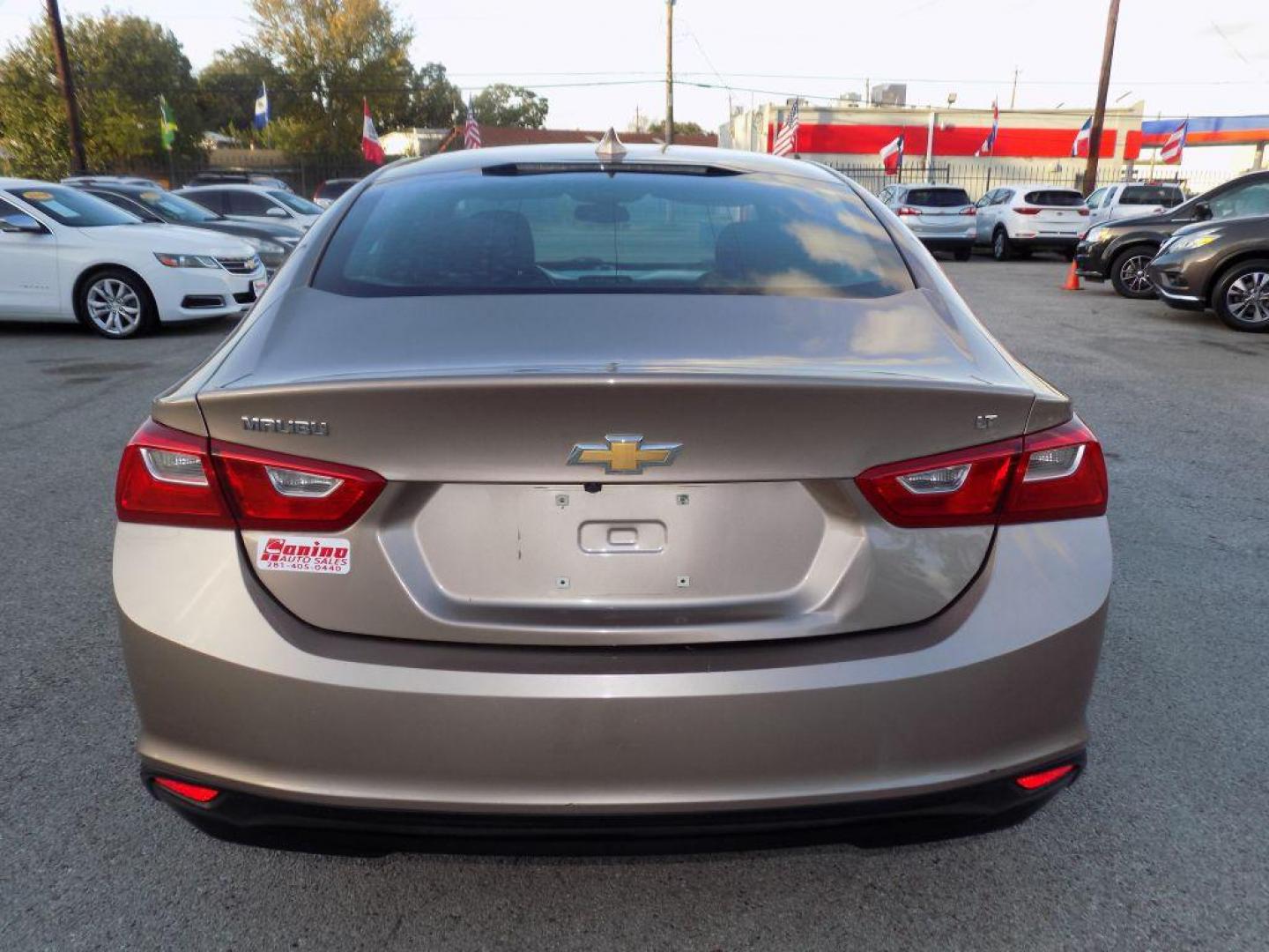 2018 GOLD CHEVROLET MALIBU LT (1G1ZD5ST3JF) with an 1.5L engine, Automatic transmission, located at 830 E. Canino Rd., Houston, TX, 77037, (281) 405-0440, 38.358219, -81.729942 - Photo#4