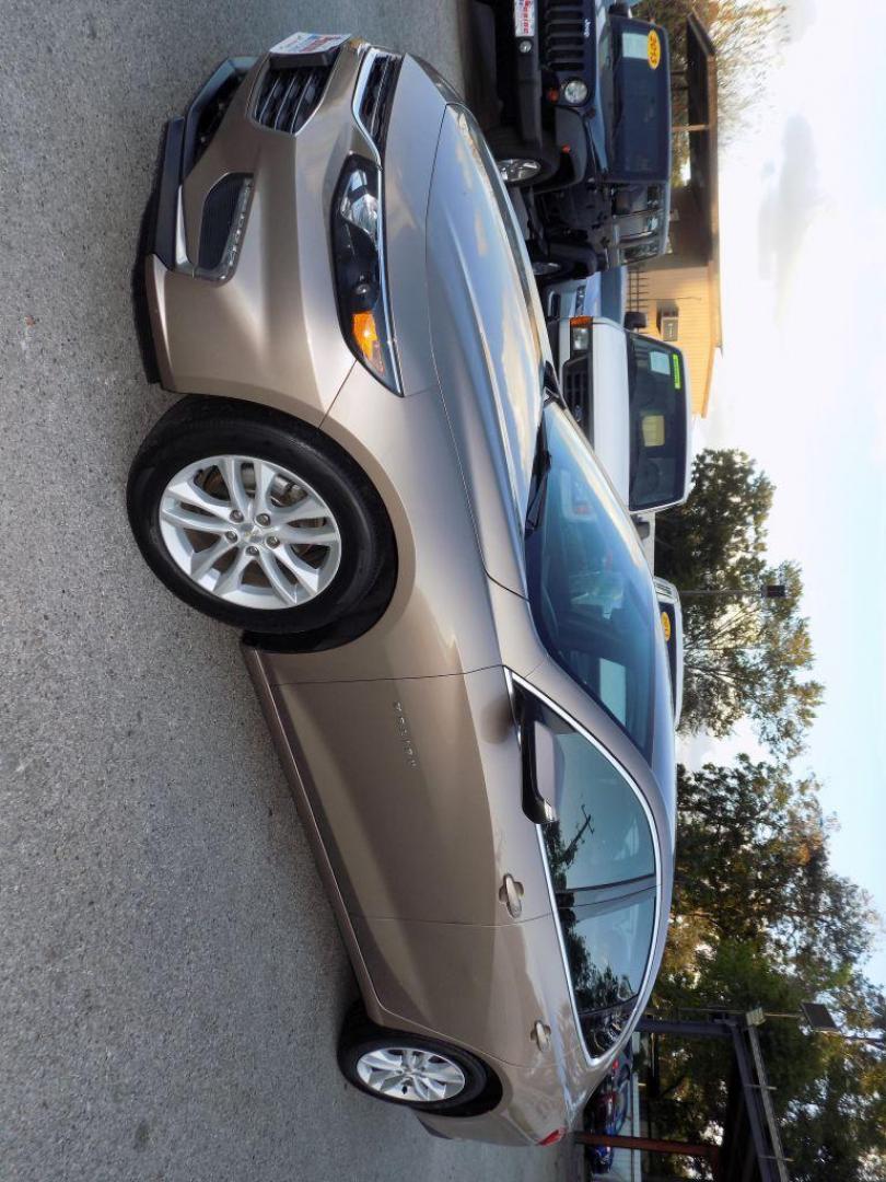 2018 GOLD CHEVROLET MALIBU LT (1G1ZD5ST3JF) with an 1.5L engine, Automatic transmission, located at 830 E. Canino Rd., Houston, TX, 77037, (281) 405-0440, 38.358219, -81.729942 - Photo#7