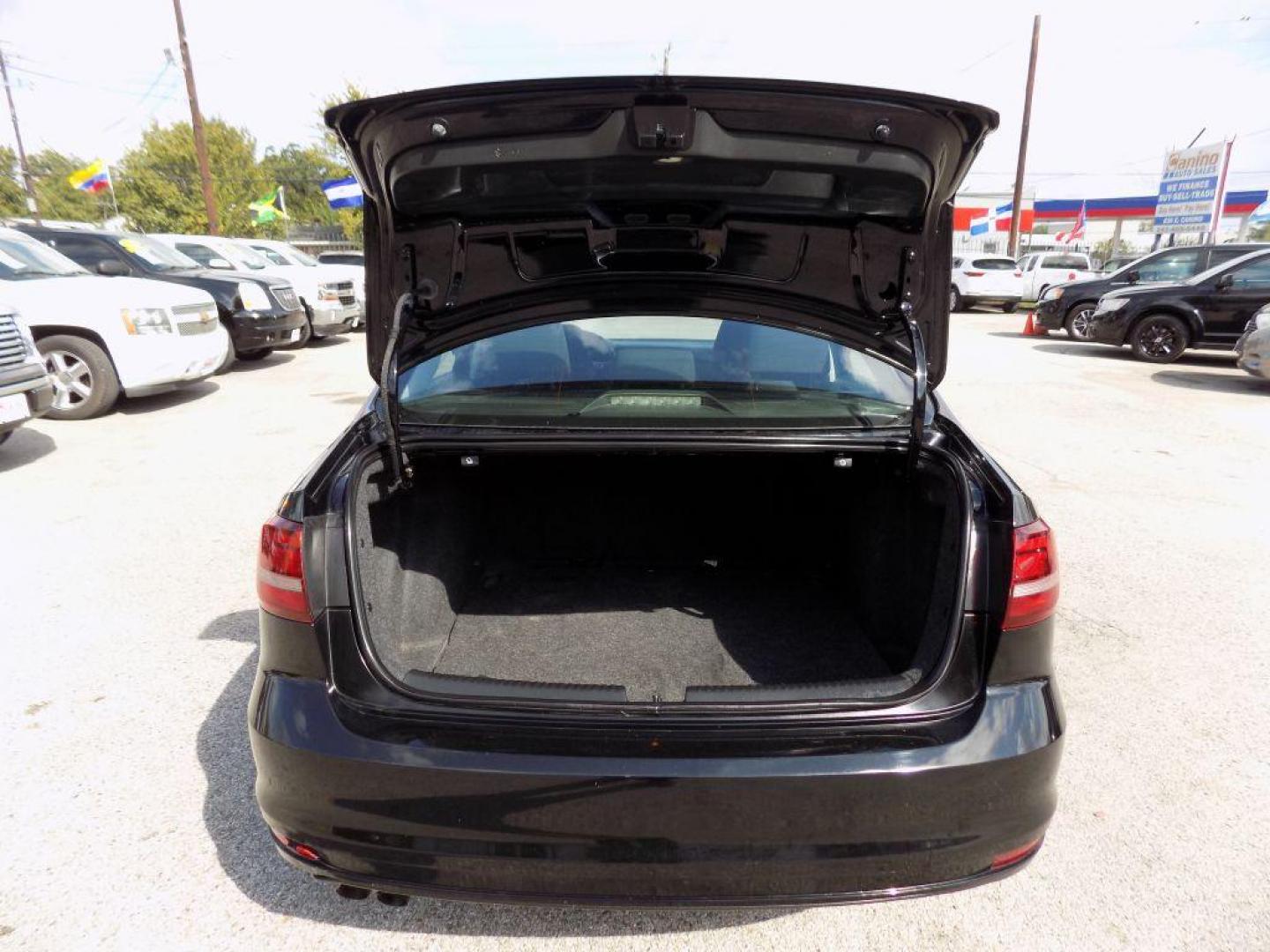 2016 BLACK VOLKSWAGEN JETTA S (3VW267AJ7GM) with an 1.4L engine, Automatic transmission, located at 830 E. Canino Rd., Houston, TX, 77037, (281) 405-0440, 38.358219, -81.729942 - Photo#15