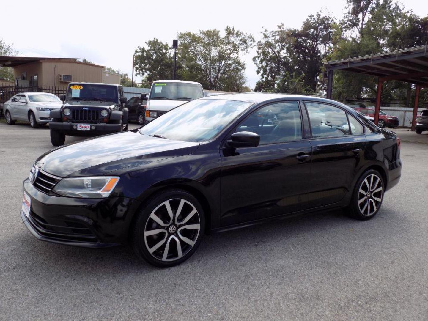 2016 BLACK VOLKSWAGEN JETTA S (3VW267AJ7GM) with an 1.4L engine, Automatic transmission, located at 830 E. Canino Rd., Houston, TX, 77037, (281) 405-0440, 38.358219, -81.729942 - Photo#4