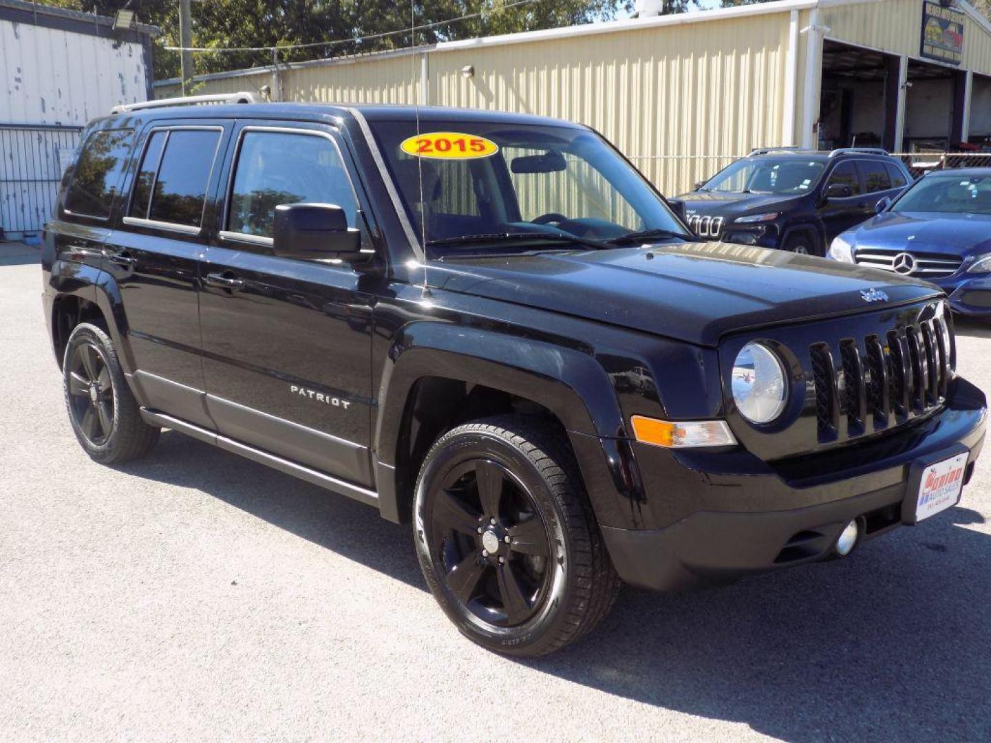 2015 BLACK JEEP PATRIOT LATITUDE (1C4NJPFAXFD) with an 2.0L engine, Continuously Variable transmission, located at 830 E. Canino Rd., Houston, TX, 77037, (281) 405-0440, 38.358219, -81.729942 - Photo#1