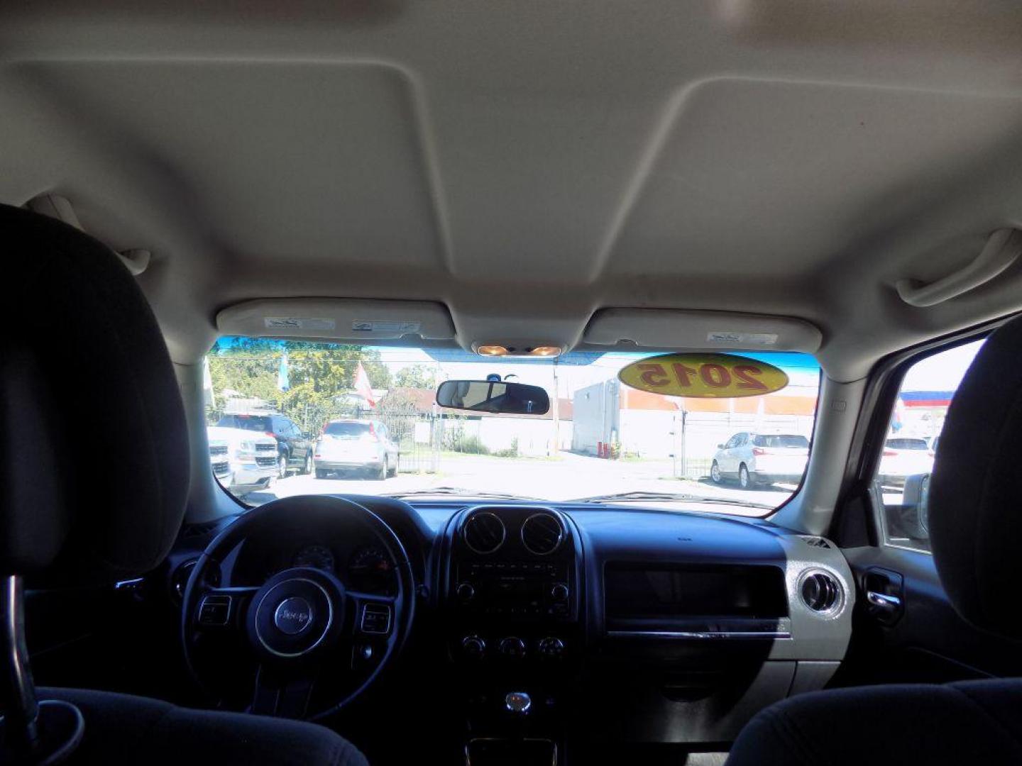 2015 BLACK JEEP PATRIOT LATITUDE (1C4NJPFAXFD) with an 2.0L engine, Continuously Variable transmission, located at 830 E. Canino Rd., Houston, TX, 77037, (281) 405-0440, 38.358219, -81.729942 - Photo#23