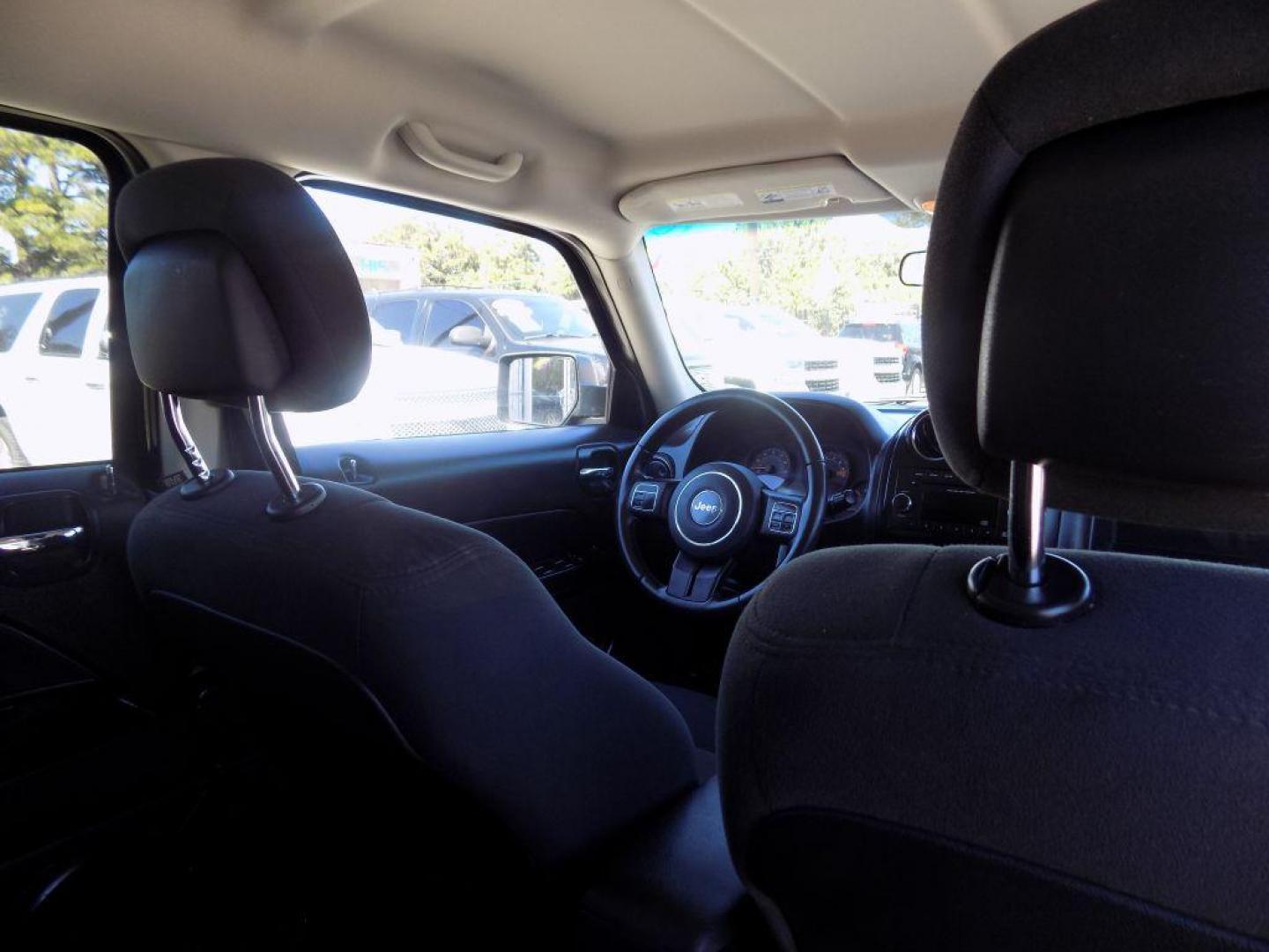 2015 BLACK JEEP PATRIOT LATITUDE (1C4NJPFAXFD) with an 2.0L engine, Continuously Variable transmission, located at 830 E. Canino Rd., Houston, TX, 77037, (281) 405-0440, 38.358219, -81.729942 - Photo#24