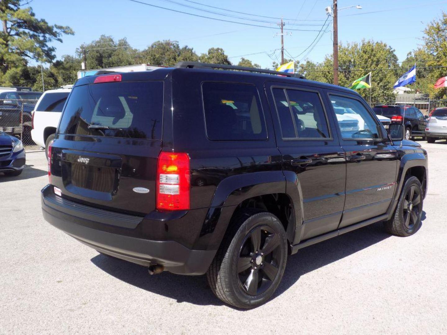 2015 BLACK JEEP PATRIOT LATITUDE (1C4NJPFAXFD) with an 2.0L engine, Continuously Variable transmission, located at 830 E. Canino Rd., Houston, TX, 77037, (281) 405-0440, 38.358219, -81.729942 - Photo#3