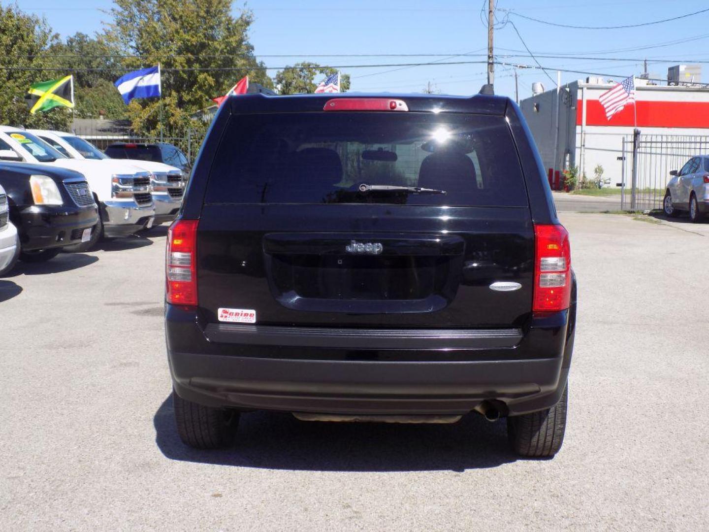 2015 BLACK JEEP PATRIOT LATITUDE (1C4NJPFAXFD) with an 2.0L engine, Continuously Variable transmission, located at 830 E. Canino Rd., Houston, TX, 77037, (281) 405-0440, 38.358219, -81.729942 - Photo#4