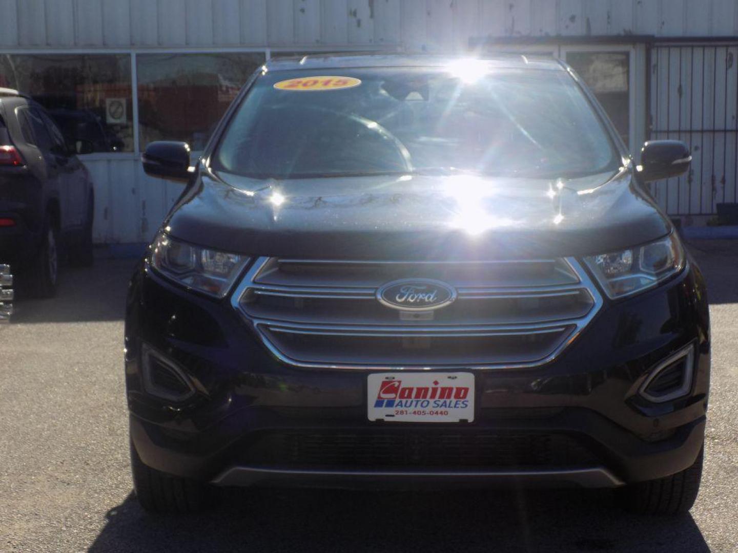 2015 BLACK FORD EDGE TITANIUM (2FMPK4K90FB) with an 2.0L engine, Automatic transmission, located at 830 E. Canino Rd., Houston, TX, 77037, (281) 405-0440, 38.358219, -81.729942 - Photo#0