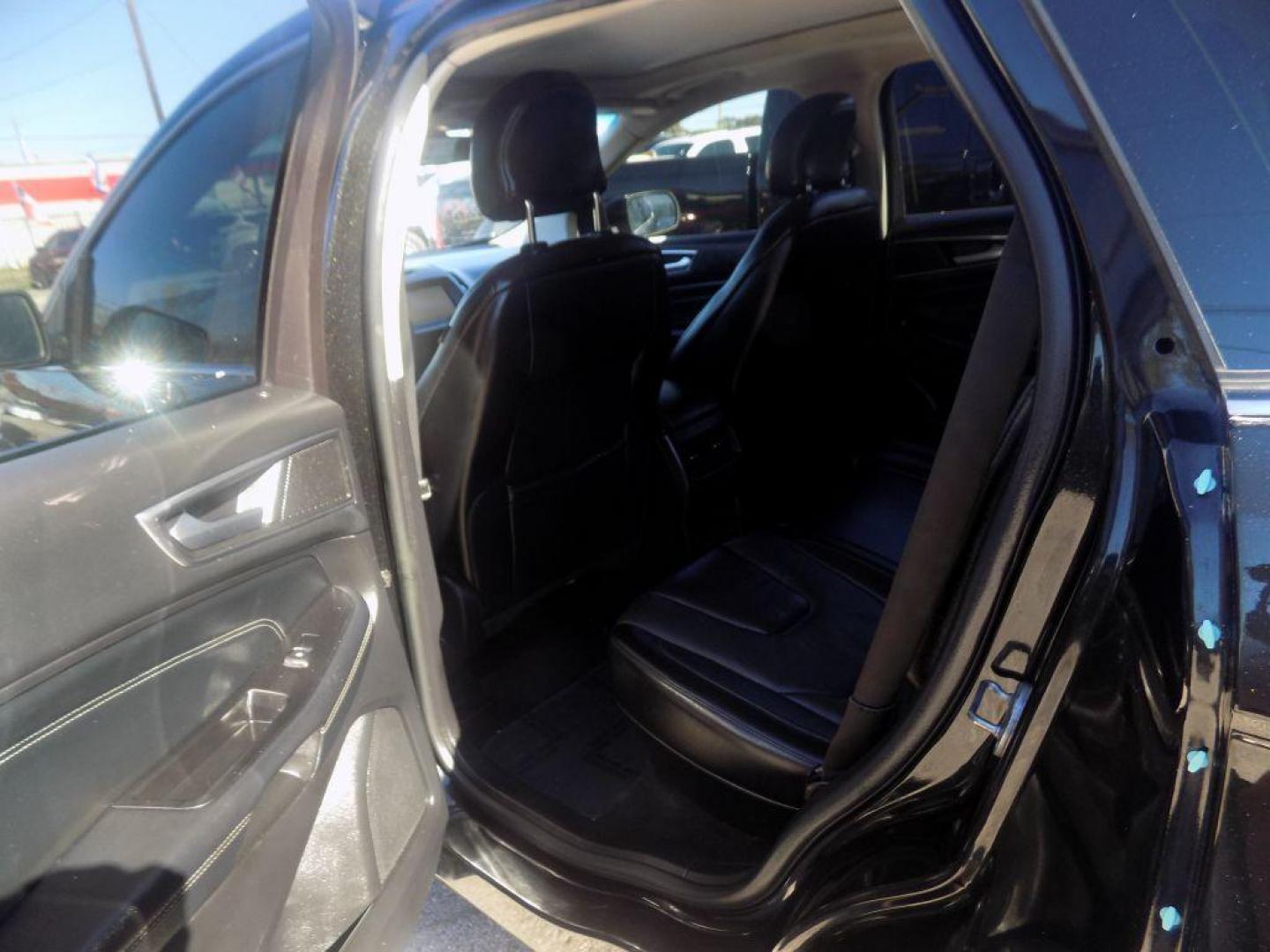 2015 BLACK FORD EDGE TITANIUM (2FMPK4K90FB) with an 2.0L engine, Automatic transmission, located at 830 E. Canino Rd., Houston, TX, 77037, (281) 405-0440, 38.358219, -81.729942 - Photo#9