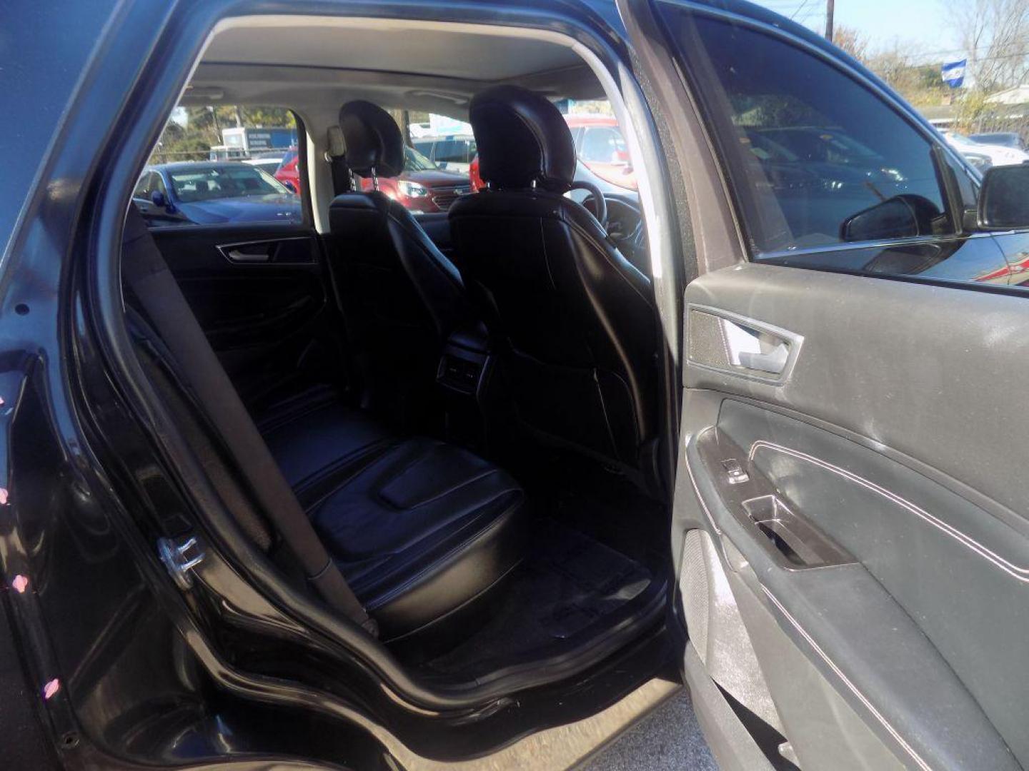 2015 BLACK FORD EDGE TITANIUM (2FMPK4K90FB) with an 2.0L engine, Automatic transmission, located at 830 E. Canino Rd., Houston, TX, 77037, (281) 405-0440, 38.358219, -81.729942 - Photo#13