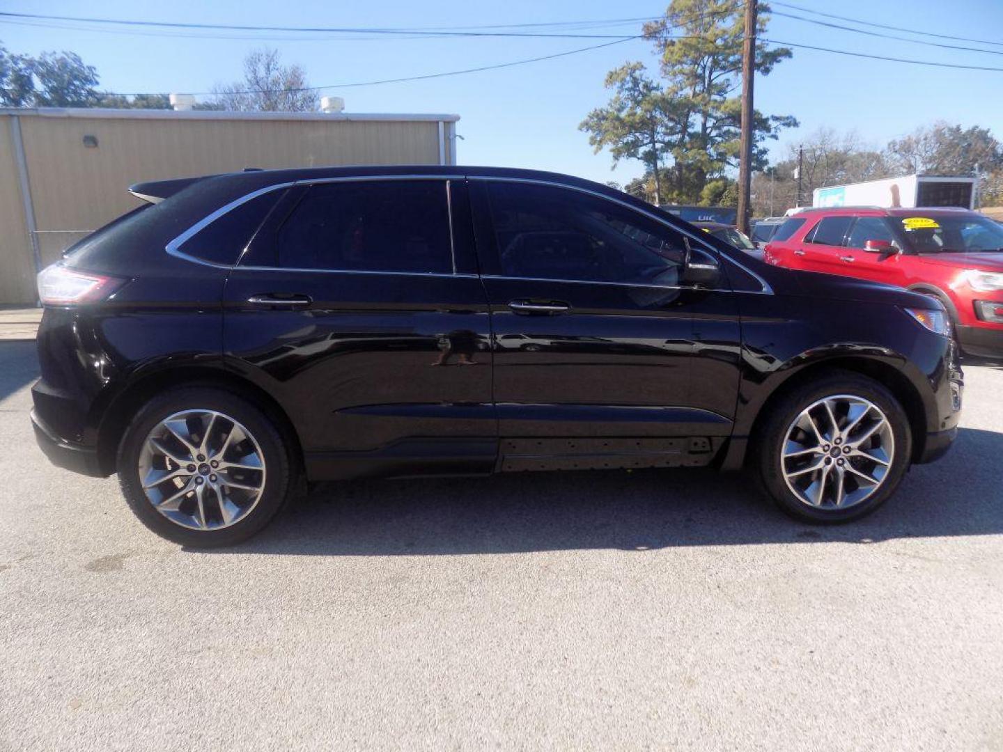 2015 BLACK FORD EDGE TITANIUM (2FMPK4K90FB) with an 2.0L engine, Automatic transmission, located at 830 E. Canino Rd., Houston, TX, 77037, (281) 405-0440, 38.358219, -81.729942 - Photo#17