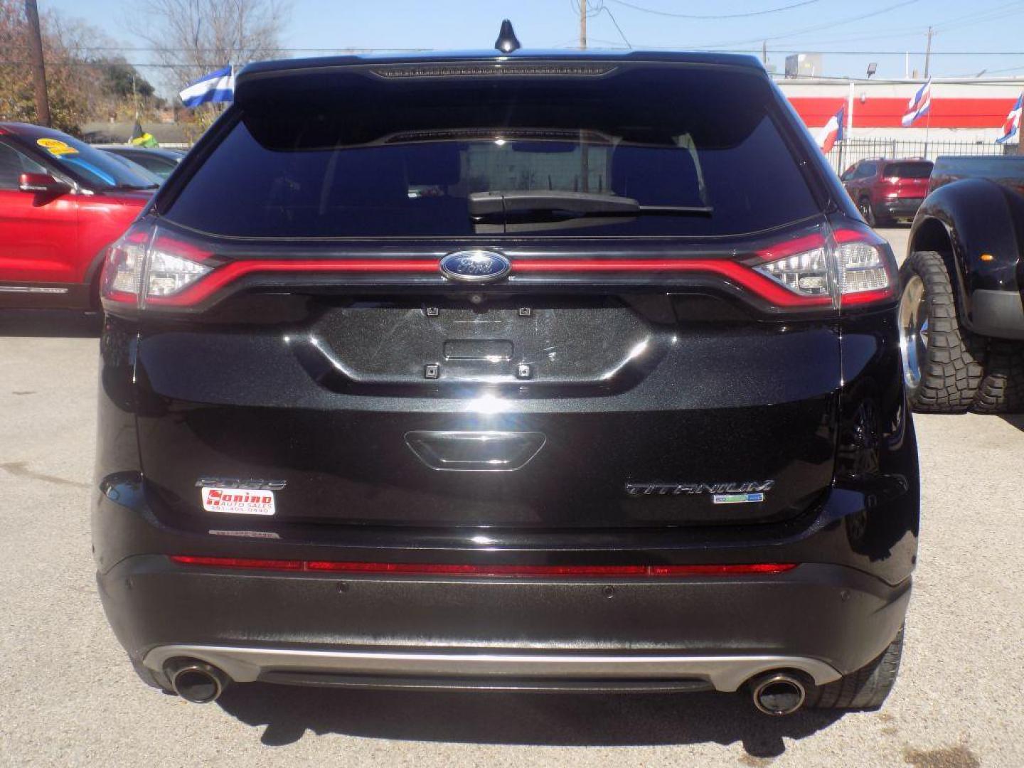 2015 BLACK FORD EDGE TITANIUM (2FMPK4K90FB) with an 2.0L engine, Automatic transmission, located at 830 E. Canino Rd., Houston, TX, 77037, (281) 405-0440, 38.358219, -81.729942 - Photo#3