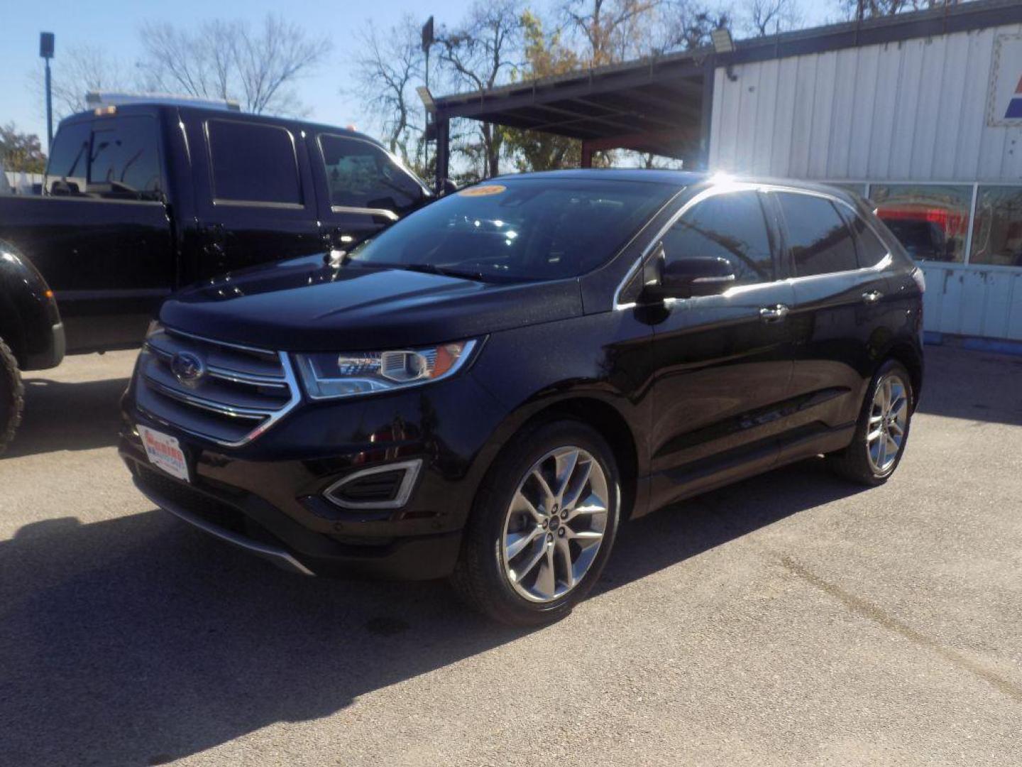 2015 BLACK FORD EDGE TITANIUM (2FMPK4K90FB) with an 2.0L engine, Automatic transmission, located at 830 E. Canino Rd., Houston, TX, 77037, (281) 405-0440, 38.358219, -81.729942 - Photo#6