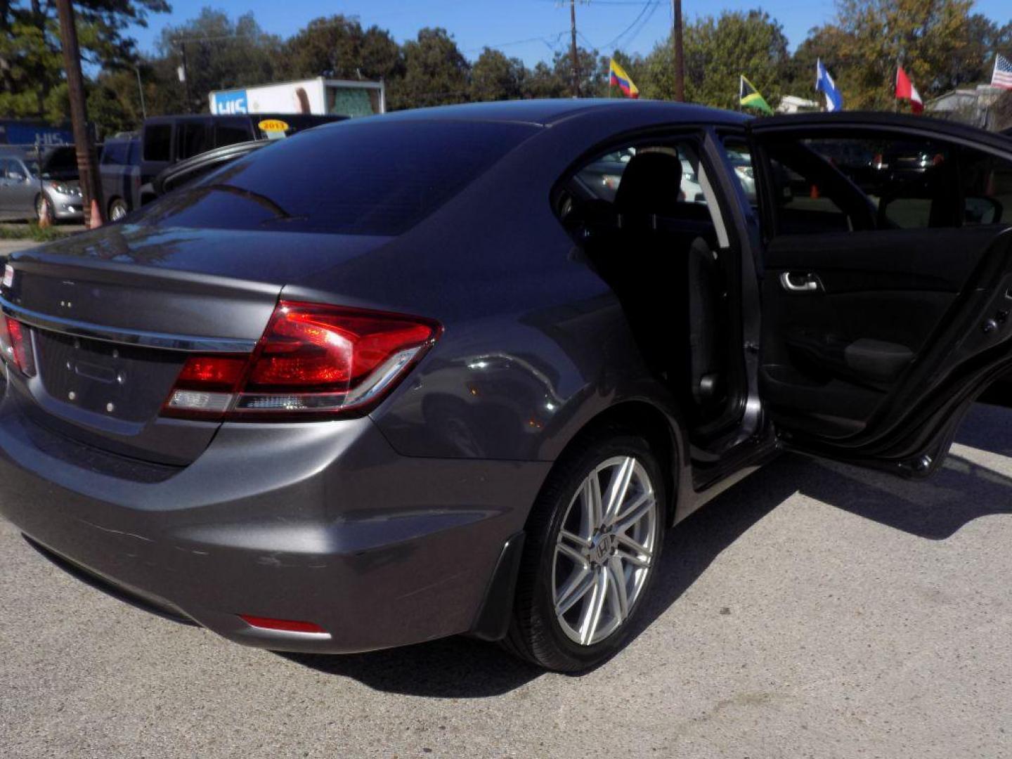 2015 GRAY HONDA CIVIC LX (19XFB2F56FE) with an 1.8L engine, Continuously Variable transmission, located at 830 E. Canino Rd., Houston, TX, 77037, (281) 405-0440, 38.358219, -81.729942 - VENGA A VISITARNOS A CANINO AUTO SALES. ENTRE CAMINANDO Y SALGA MANEJANDO. APROVACION GARANTIZADA CON REQUISITOS MINIMOS! PREGUNTEN POR JESSICA, MAY, O CARRIE PARA SU APROBACION SEGURA. ??830 E CANINO RD HOUSTON TX 77037 ??(281) 405-0440 come visit us today!! walk in/ drive out in minutes! - Photo#3