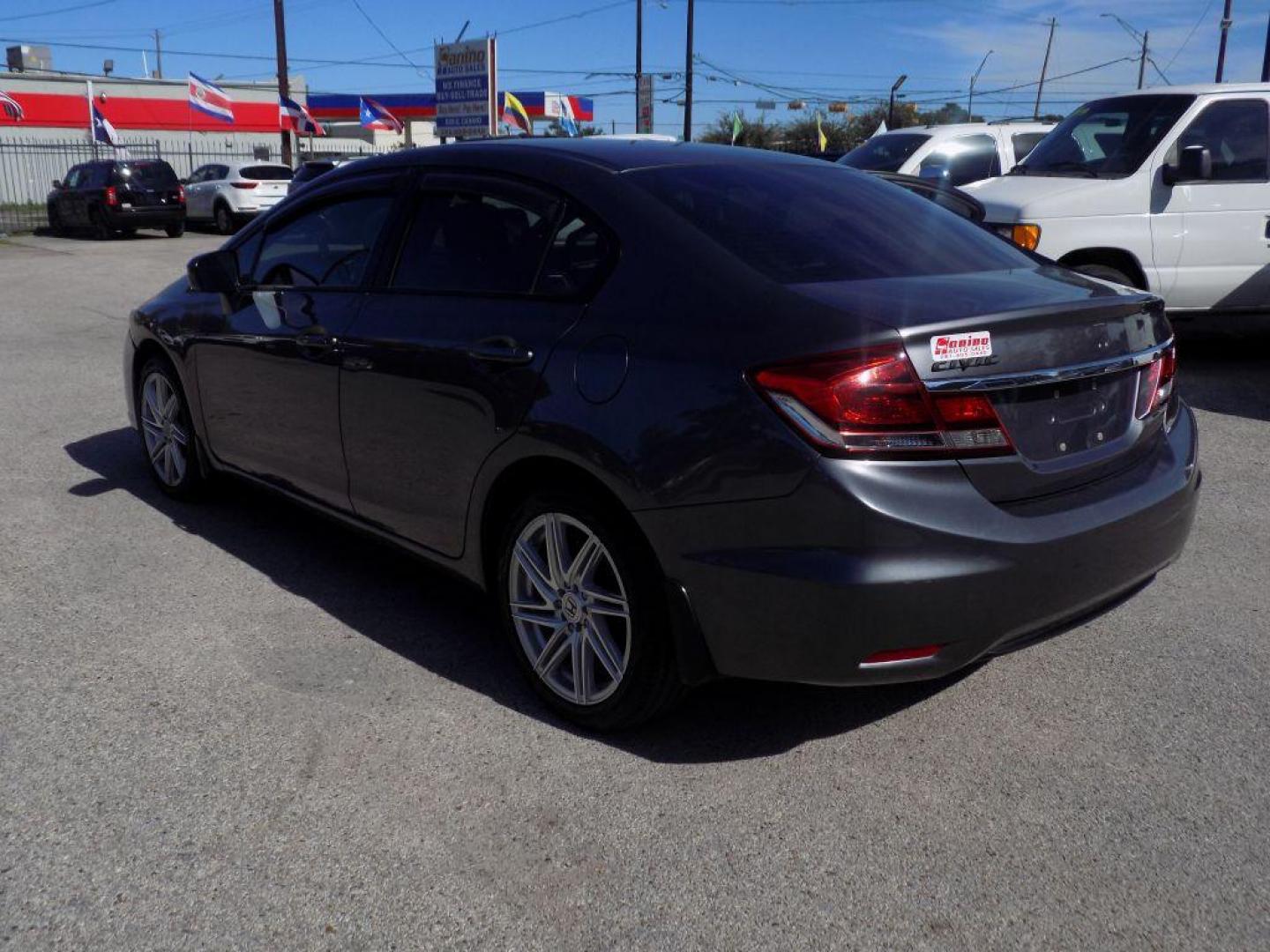 2015 GRAY HONDA CIVIC LX (19XFB2F56FE) with an 1.8L engine, Continuously Variable transmission, located at 830 E. Canino Rd., Houston, TX, 77037, (281) 405-0440, 38.358219, -81.729942 - VENGA A VISITARNOS A CANINO AUTO SALES. ENTRE CAMINANDO Y SALGA MANEJANDO. APROVACION GARANTIZADA CON REQUISITOS MINIMOS! PREGUNTEN POR JESSICA, MAY, O CARRIE PARA SU APROBACION SEGURA. ??830 E CANINO RD HOUSTON TX 77037 ??(281) 405-0440 come visit us today!! walk in/ drive out in minutes! - Photo#6