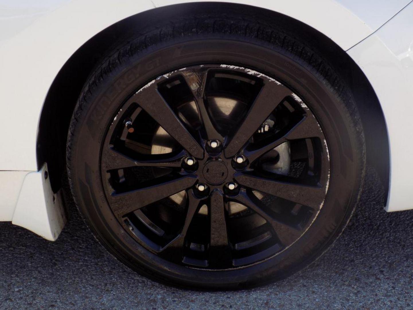 2018 WHITE NISSAN ALTIMA 2.5 (1N4AL3AP6JC) with an 2.5L engine, Continuously Variable transmission, located at 830 E. Canino Rd., Houston, TX, 77037, (281) 405-0440, 38.358219, -81.729942 - Photo#19