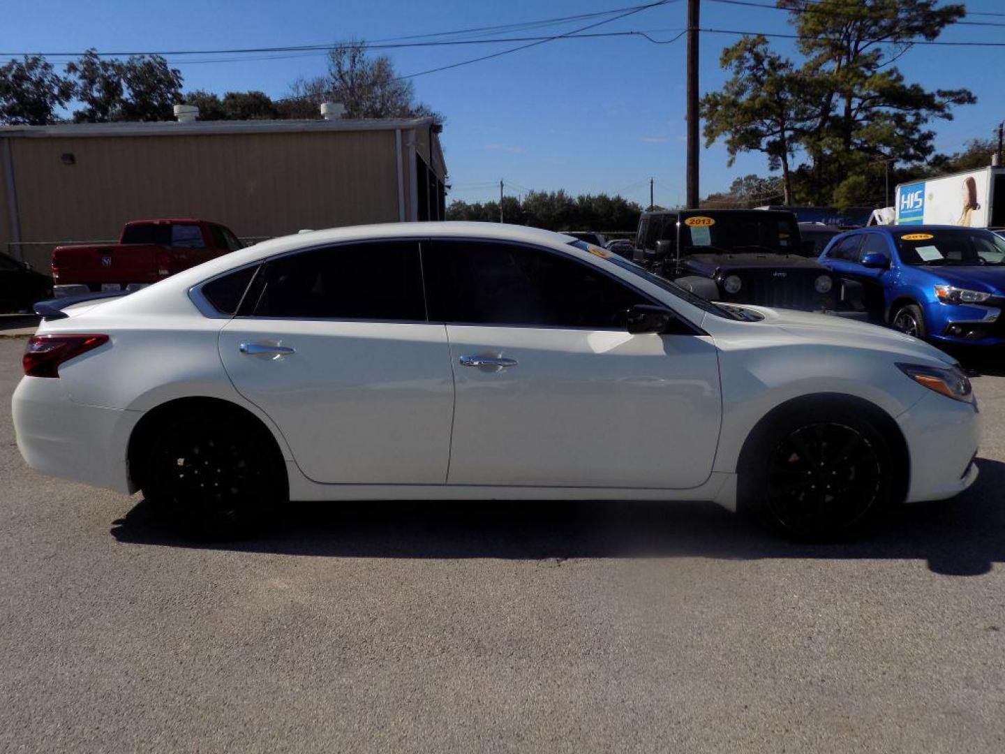 2018 WHITE NISSAN ALTIMA 2.5 (1N4AL3AP6JC) with an 2.5L engine, Continuously Variable transmission, located at 830 E. Canino Rd., Houston, TX, 77037, (281) 405-0440, 38.358219, -81.729942 - Photo#2