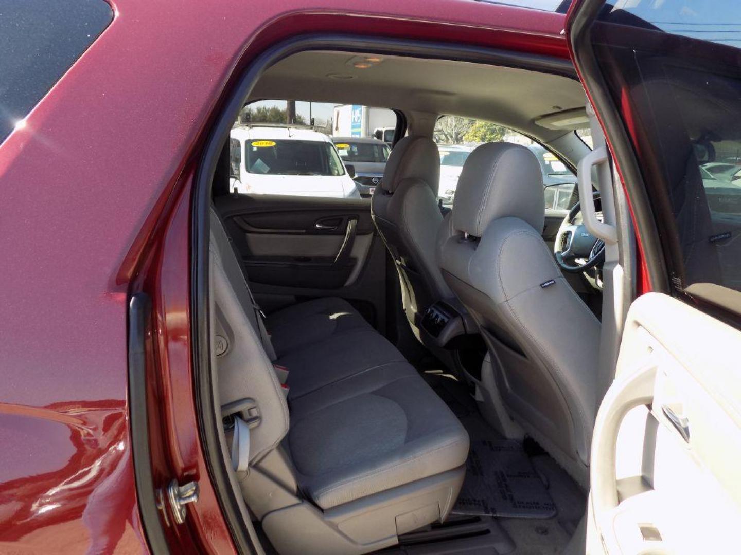 2016 RED GMC ACADIA SLE (1GKKRNED1GJ) with an 3.6L engine, Automatic transmission, located at 830 E. Canino Rd., Houston, TX, 77037, (281) 405-0440, 38.358219, -81.729942 - VENGA A VISITARNOS A CANINO AUTO SALES. ENTRE CAMINANDO Y SALGA MANEJANDO. APROVACION GARANTIZADA CON REQUISITOS MINIMOS! PREGUNTEN POR JESSICA, MAY, O CARRIE PARA SU APROBACION SEGURA. ??830 E CANINO RD HOUSTON TX 77037 ??(281) 405-0440 come visit us today!! walk in/ drive out in minutes! - Photo#14