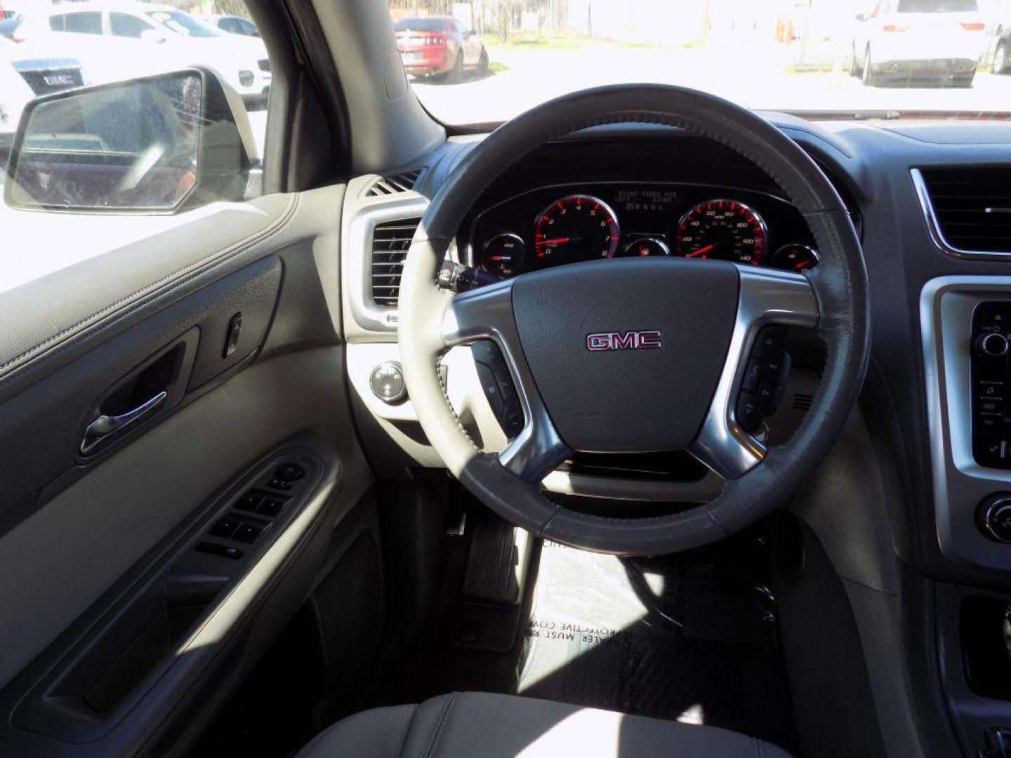 2016 RED GMC ACADIA SLE (1GKKRNED1GJ) with an 3.6L engine, Automatic transmission, located at 830 E. Canino Rd., Houston, TX, 77037, (281) 405-0440, 38.358219, -81.729942 - VENGA A VISITARNOS A CANINO AUTO SALES. ENTRE CAMINANDO Y SALGA MANEJANDO. APROVACION GARANTIZADA CON REQUISITOS MINIMOS! PREGUNTEN POR JESSICA, MAY, O CARRIE PARA SU APROBACION SEGURA. ??830 E CANINO RD HOUSTON TX 77037 ??(281) 405-0440 come visit us today!! walk in/ drive out in minutes! - Photo#9