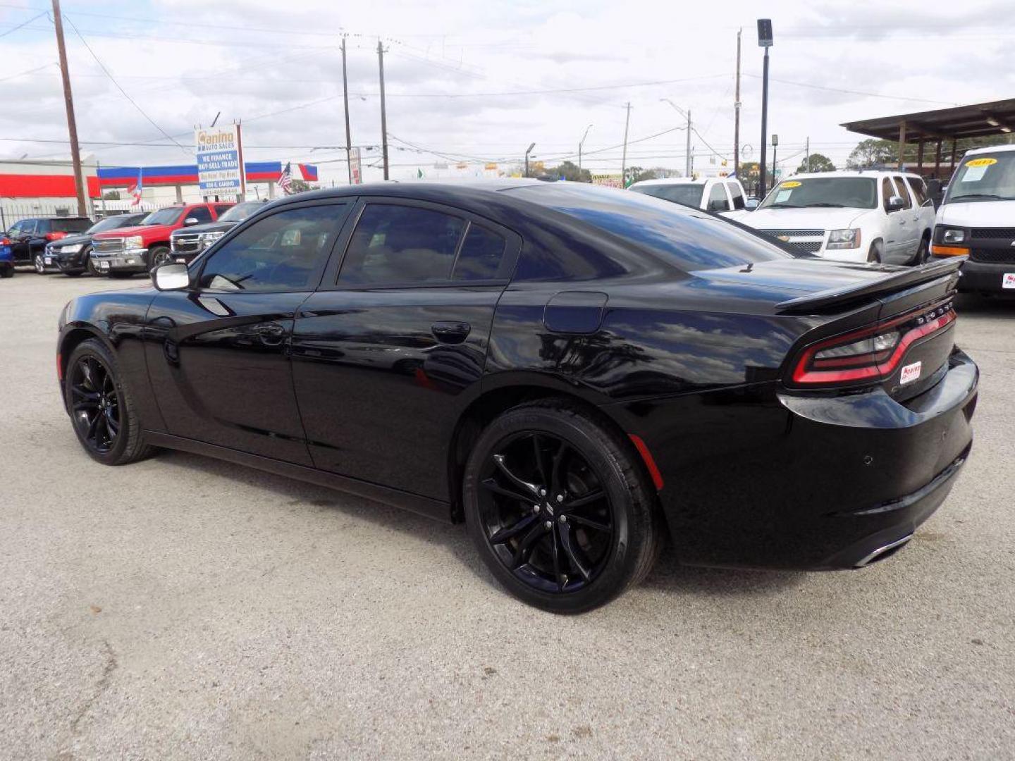 2018 BLACK DODGE CHARGER SXT (2C3CDXBG1JH) with an 3.6L engine, Automatic transmission, located at 830 E. Canino Rd., Houston, TX, 77037, (281) 405-0440, 38.358219, -81.729942 - Photo#4