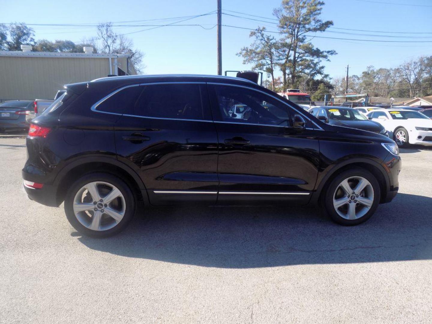 2017 BLACK LINCOLN MKC PREMIERE (5LMCJ1C99HU) with an 2.0L engine, Automatic transmission, located at 830 E. Canino Rd., Houston, TX, 77037, (281) 405-0440, 38.358219, -81.729942 - Photo#10