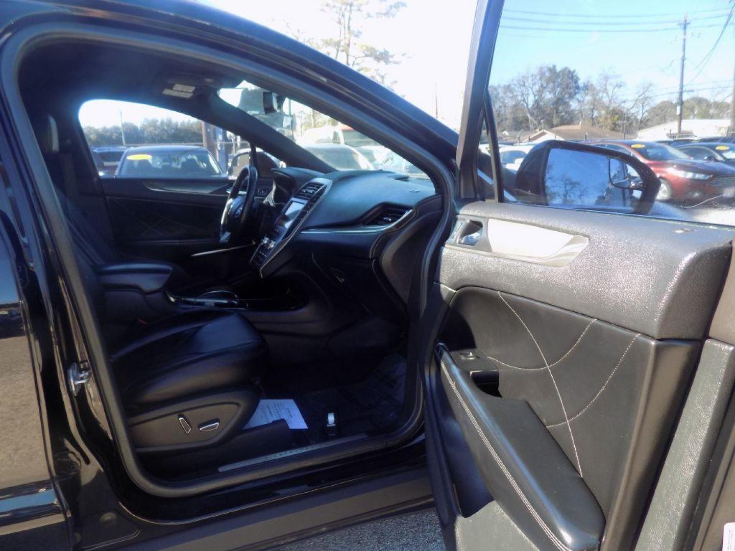 2017 BLACK LINCOLN MKC PREMIERE (5LMCJ1C99HU) with an 2.0L engine, Automatic transmission, located at 830 E. Canino Rd., Houston, TX, 77037, (281) 405-0440, 38.358219, -81.729942 - Photo#11