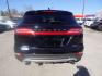 2017 BLACK LINCOLN MKC PREMIERE (5LMCJ1C99HU) with an 2.0L engine, Automatic transmission, located at 830 E. Canino Rd., Houston, TX, 77037, (281) 405-0440, 38.358219, -81.729942 - Photo#4