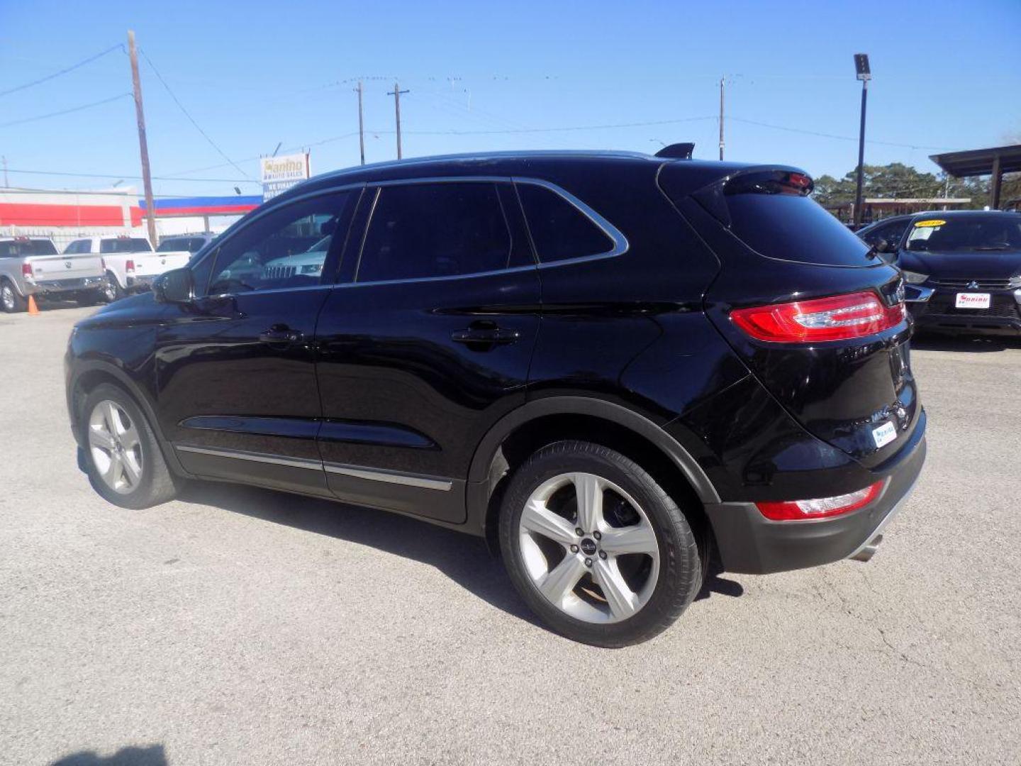 2017 BLACK LINCOLN MKC PREMIERE (5LMCJ1C99HU) with an 2.0L engine, Automatic transmission, located at 830 E. Canino Rd., Houston, TX, 77037, (281) 405-0440, 38.358219, -81.729942 - Photo#5