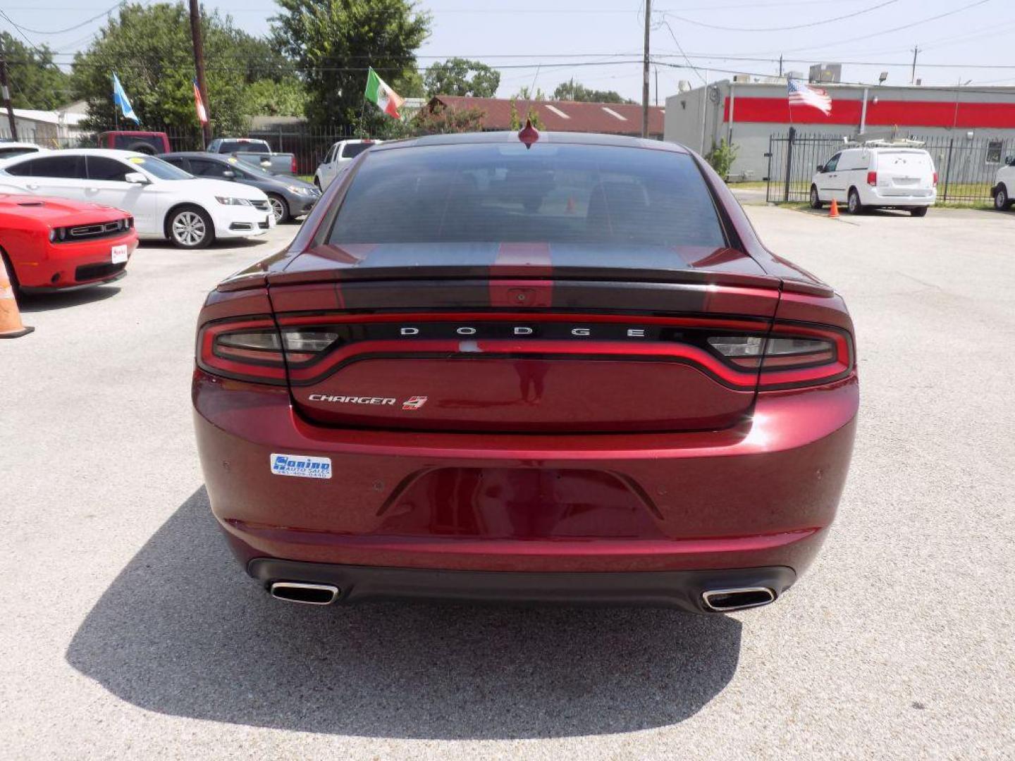 2019 MAROON DODGE CHARGER SXT (2C3CDXJGXKH) with an 3.6L engine, Automatic transmission, located at 830 E. Canino Rd., Houston, TX, 77037, (281) 405-0440, 38.358219, -81.729942 - Photo#2