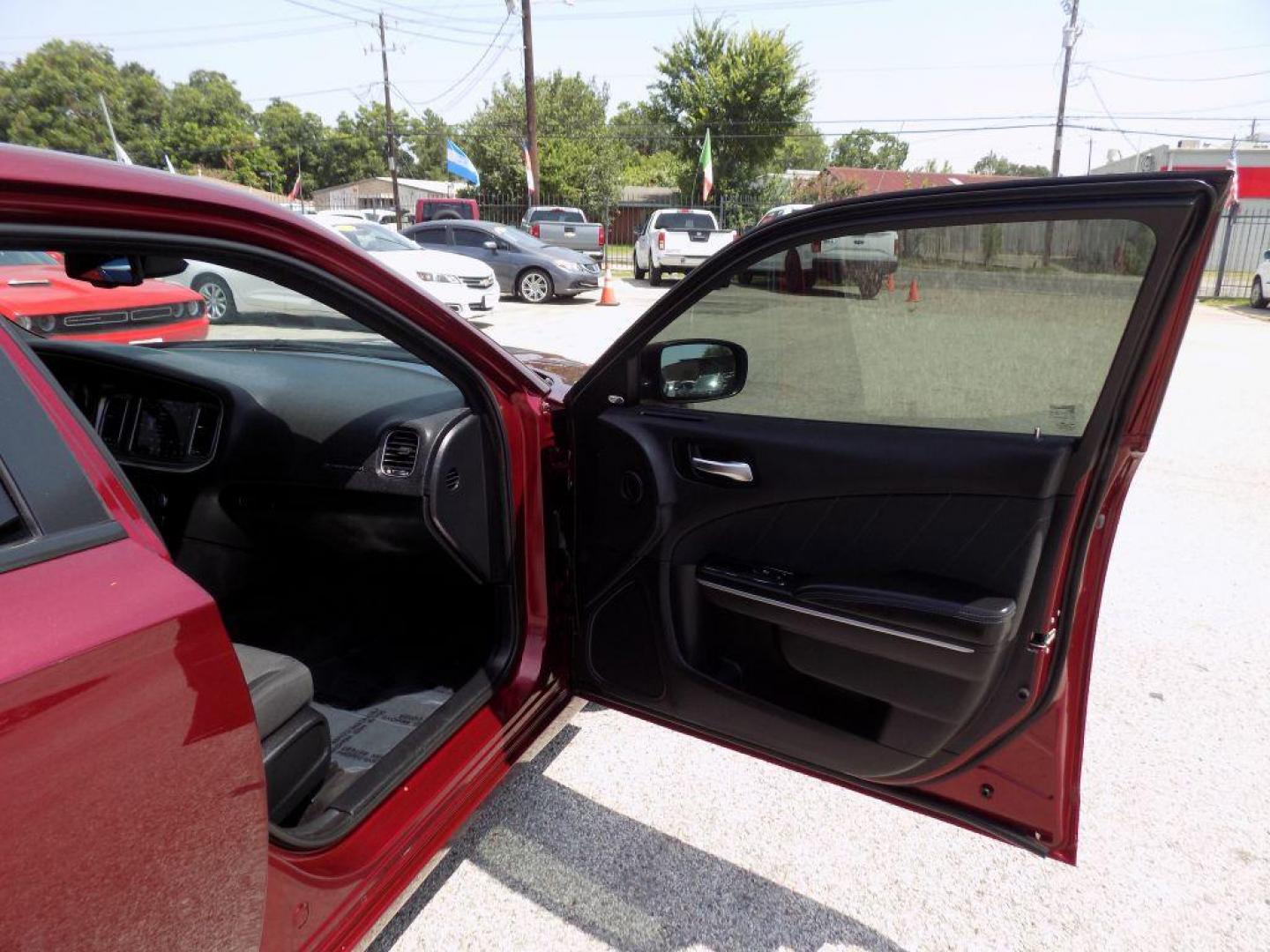 2019 MAROON DODGE CHARGER SXT (2C3CDXJGXKH) with an 3.6L engine, Automatic transmission, located at 830 E. Canino Rd., Houston, TX, 77037, (281) 405-0440, 38.358219, -81.729942 - Photo#8