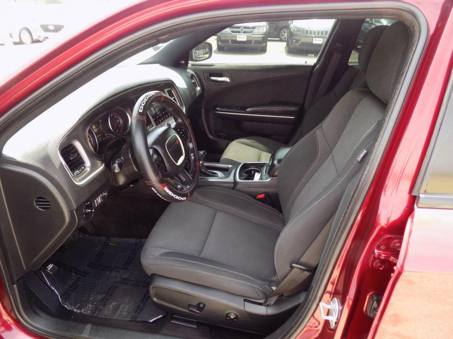 2019 MAROON DODGE CHARGER SXT (2C3CDXJGXKH) with an 3.6L engine, Automatic transmission, located at 830 E. Canino Rd., Houston, TX, 77037, (281) 405-0440, 38.358219, -81.729942 - Photo#16