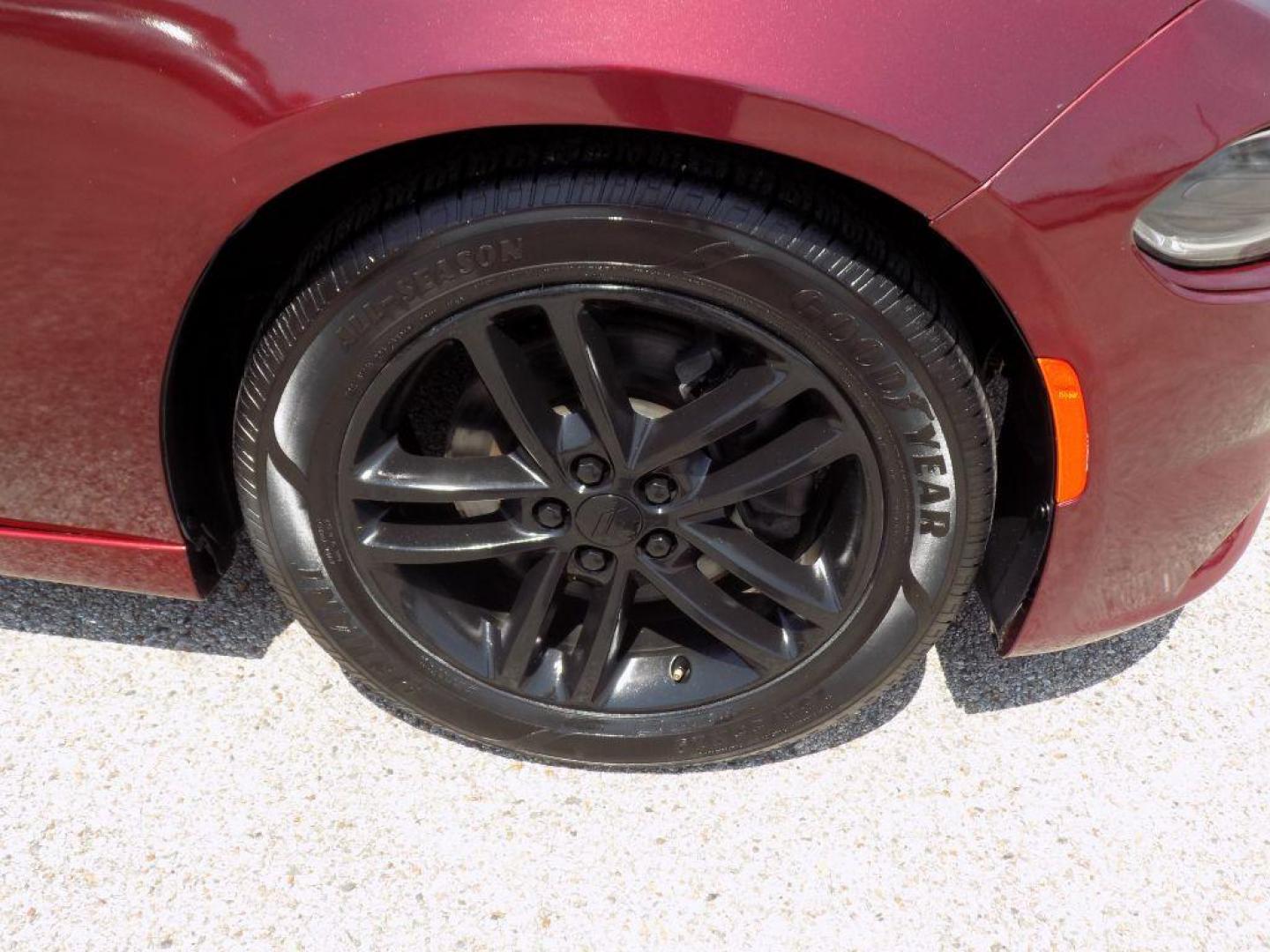 2019 MAROON DODGE CHARGER SXT (2C3CDXJGXKH) with an 3.6L engine, Automatic transmission, located at 830 E. Canino Rd., Houston, TX, 77037, (281) 405-0440, 38.358219, -81.729942 - Photo#19