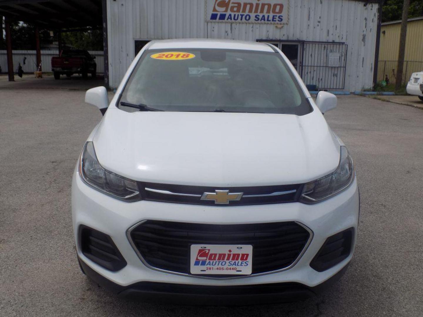 2018 WHITE CHEVROLET TRAX LS (KL7CJKSB4JB) with an 1.4L engine, Automatic transmission, located at 830 E. Canino Rd., Houston, TX, 77037, (281) 405-0440, 38.358219, -81.729942 - Photo#0