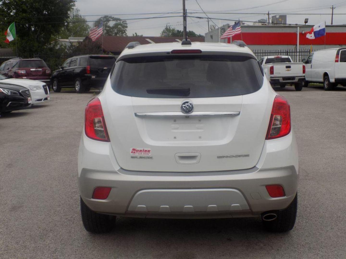 2015 WHITE BUICK ENCORE (KL4CJCSBXFB) with an 1.4L engine, Automatic transmission, located at 830 E. Canino Rd., Houston, TX, 77037, (281) 405-0440, 38.358219, -81.729942 - PRE APPROVACION FACIL, RAPIDA.... PROCESSO RAPIDO LLAMA O VISITANOS HOY MISMO ESTAMOS LOCALIZADOS EN EL 830 E. CANINO RD (ESQUINA CON AIRLINE) HOUSTON, TEXAS 777037 SU TRABAJO ES SU CREDITO!! ENTRE CAMINANDO Y SALGA MANEJANDO! LLAME YA AL (281) 405-0440 LE ESPERAMOS! - Photo#6