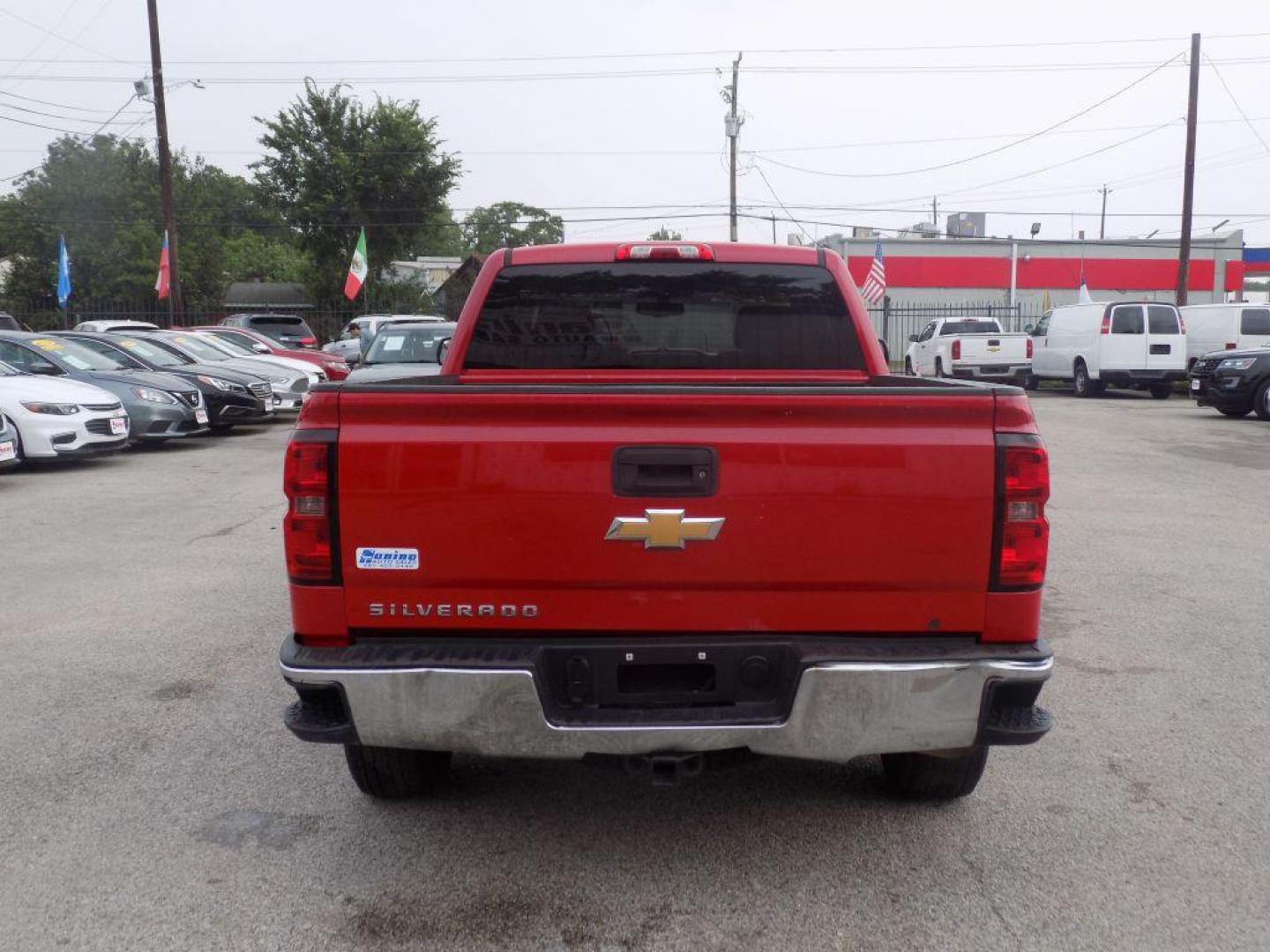 2014 RED CHEVROLET SILVERADO 1500 (1GCVKPEH0EZ) with an 4.3L engine, Automatic transmission, located at 830 E. Canino Rd., Houston, TX, 77037, (281) 405-0440, 38.358219, -81.729942 - Photo#2