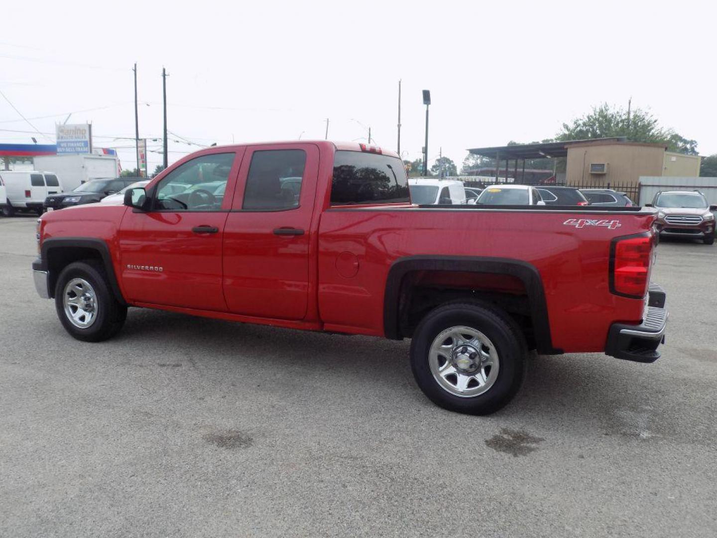 2014 RED CHEVROLET SILVERADO 1500 (1GCVKPEH0EZ) with an 4.3L engine, Automatic transmission, located at 830 E. Canino Rd., Houston, TX, 77037, (281) 405-0440, 38.358219, -81.729942 - Photo#4