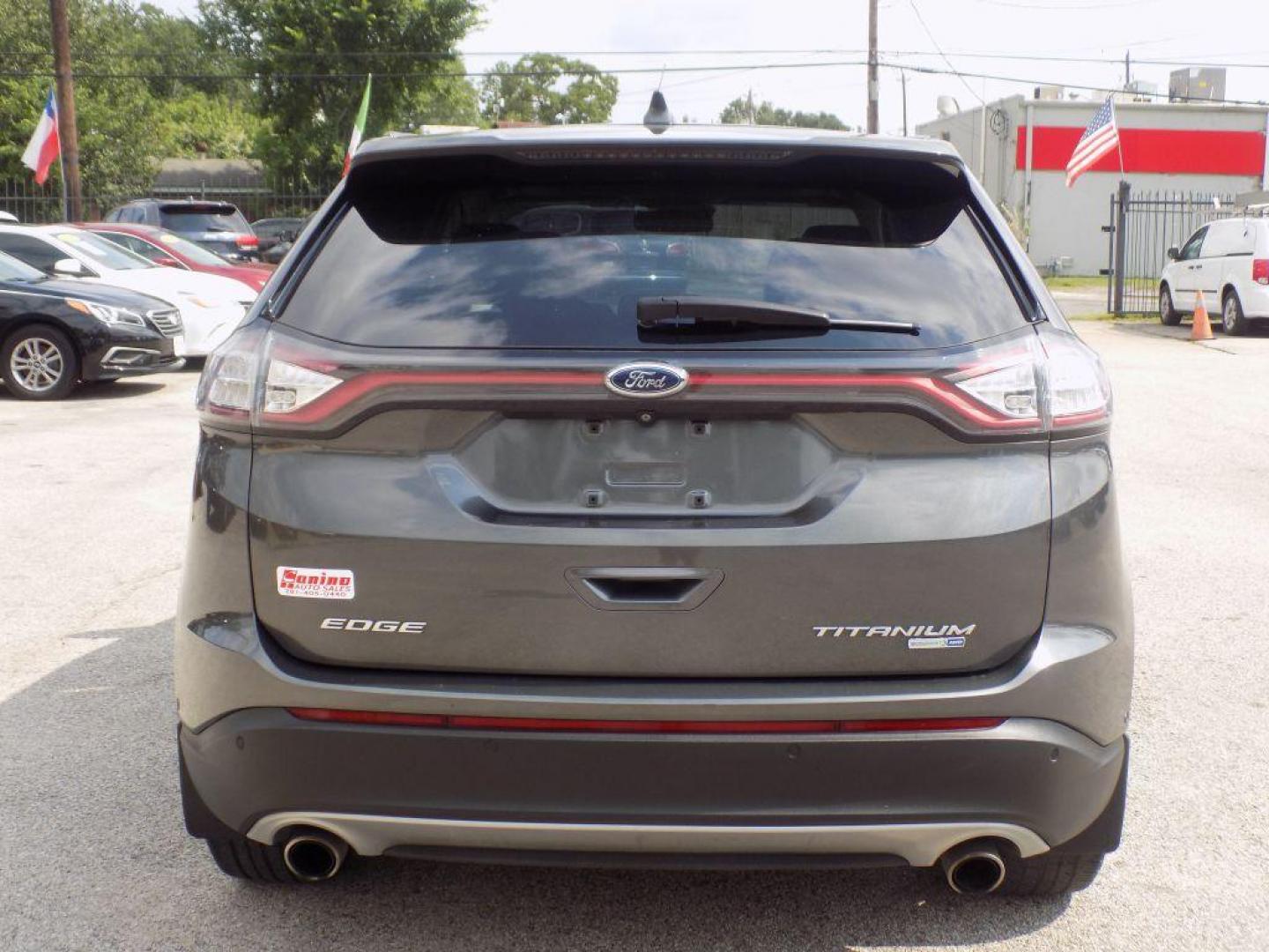 2015 GRAY FORD EDGE TITANIUM (2FMPK4K95FB) with an 2.0L engine, Automatic transmission, located at 830 E. Canino Rd., Houston, TX, 77037, (281) 405-0440, 38.358219, -81.729942 - Photo#2