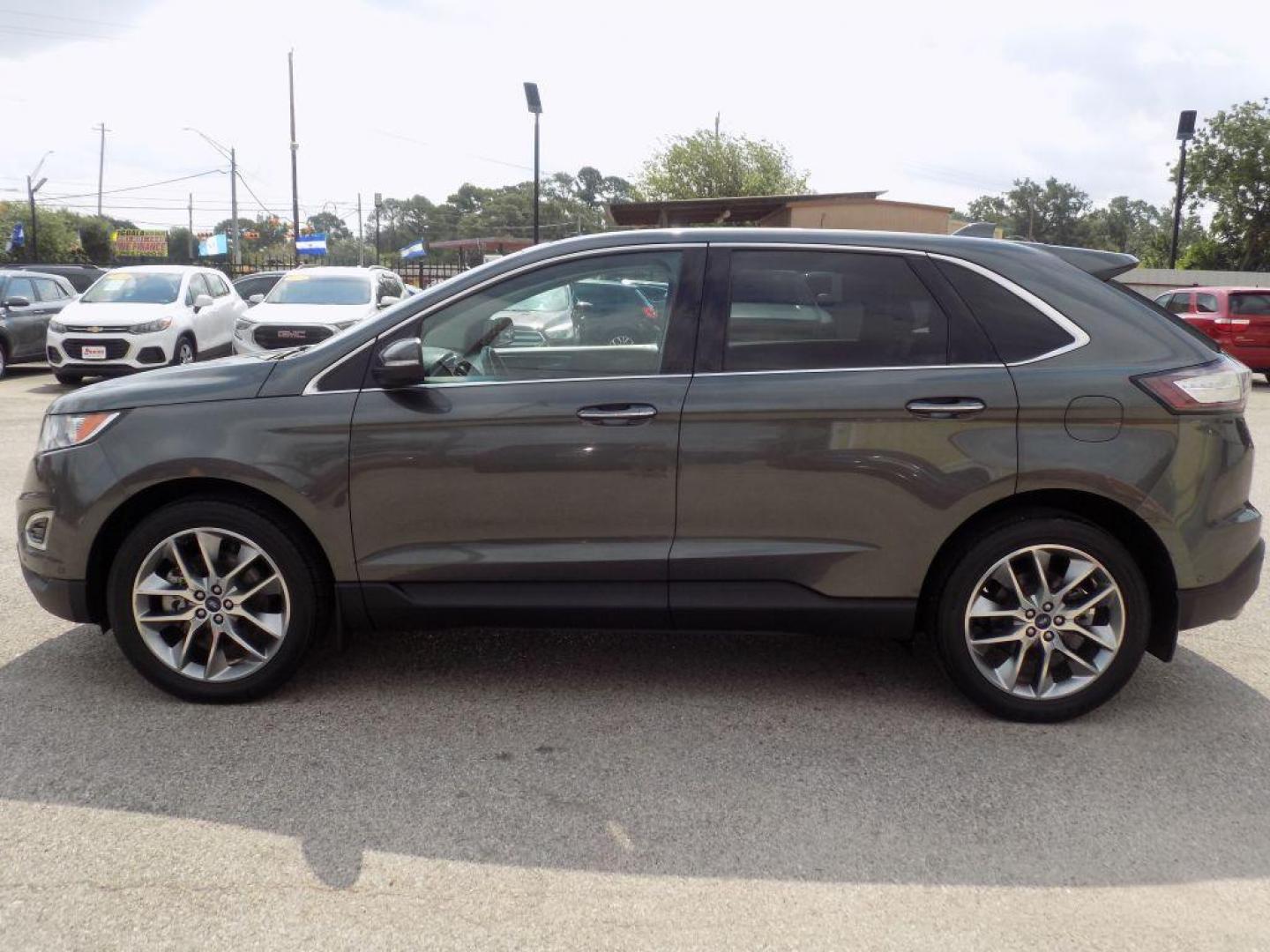 2015 GRAY FORD EDGE TITANIUM (2FMPK4K95FB) with an 2.0L engine, Automatic transmission, located at 830 E. Canino Rd., Houston, TX, 77037, (281) 405-0440, 38.358219, -81.729942 - Photo#3