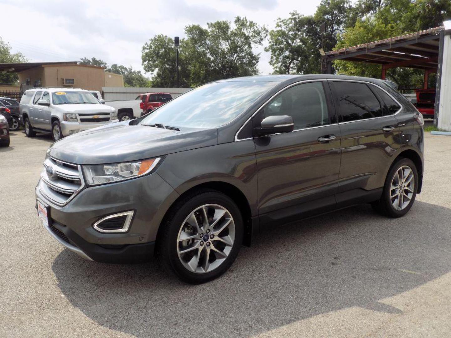 2015 GRAY FORD EDGE TITANIUM (2FMPK4K95FB) with an 2.0L engine, Automatic transmission, located at 830 E. Canino Rd., Houston, TX, 77037, (281) 405-0440, 38.358219, -81.729942 - Photo#5