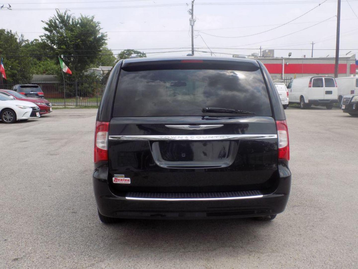 2016 BLACK CHRYSLER TOWN and COUNTRY TOURING (2C4RC1BG4GR) with an 3.6L engine, Automatic transmission, located at 830 E. Canino Rd., Houston, TX, 77037, (281) 405-0440, 38.358219, -81.729942 - Photo#2