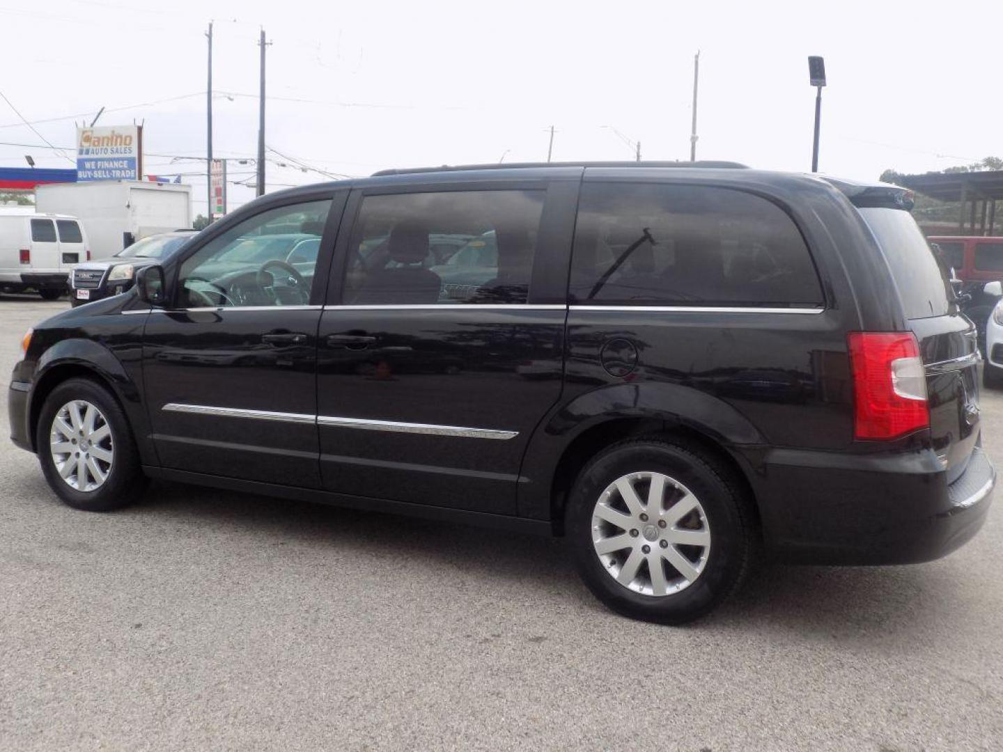 2016 BLACK CHRYSLER TOWN and COUNTRY TOURING (2C4RC1BG4GR) with an 3.6L engine, Automatic transmission, located at 830 E. Canino Rd., Houston, TX, 77037, (281) 405-0440, 38.358219, -81.729942 - Photo#4