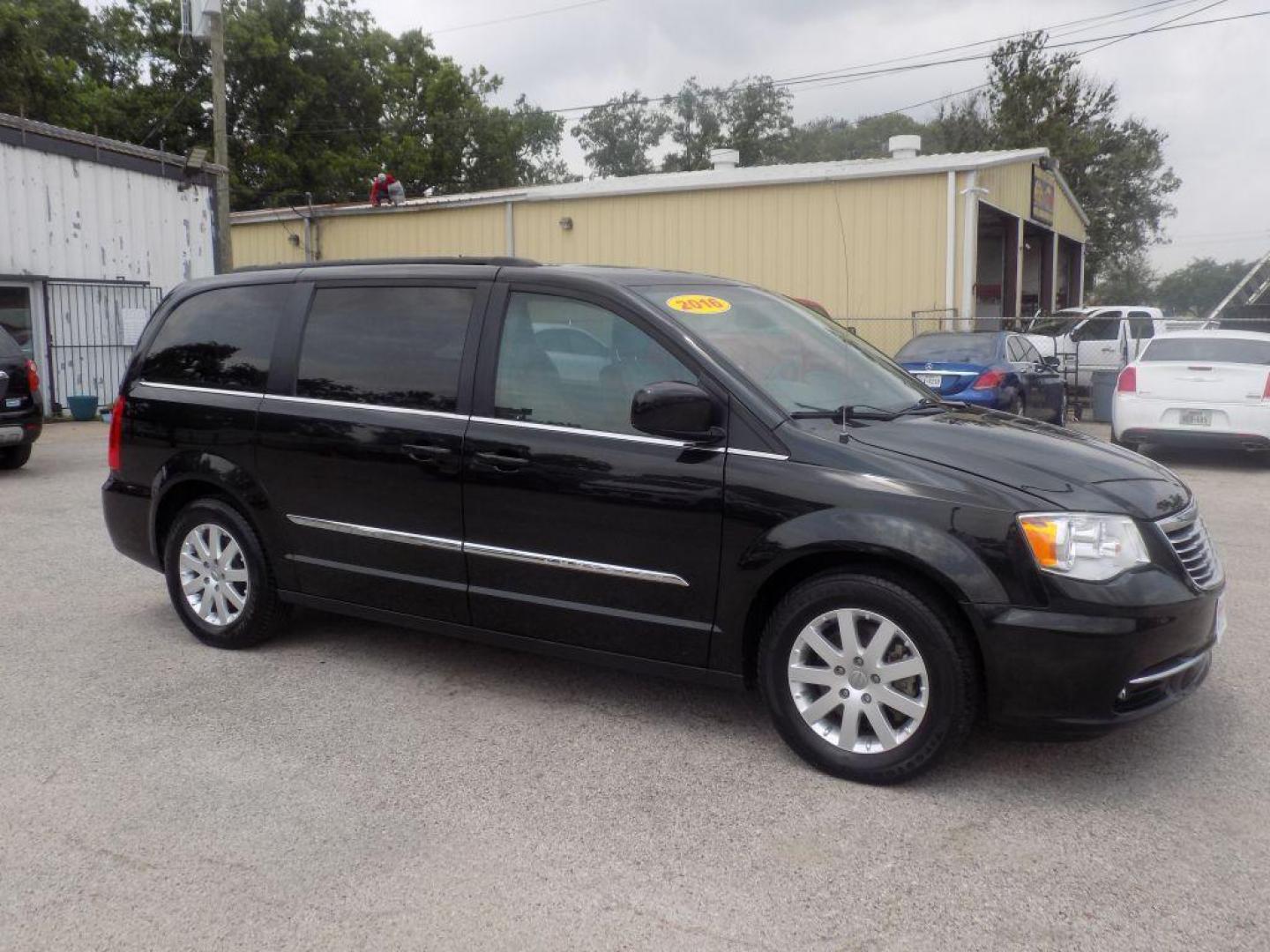 2016 BLACK CHRYSLER TOWN and COUNTRY TOURING (2C4RC1BG4GR) with an 3.6L engine, Automatic transmission, located at 830 E. Canino Rd., Houston, TX, 77037, (281) 405-0440, 38.358219, -81.729942 - Photo#6