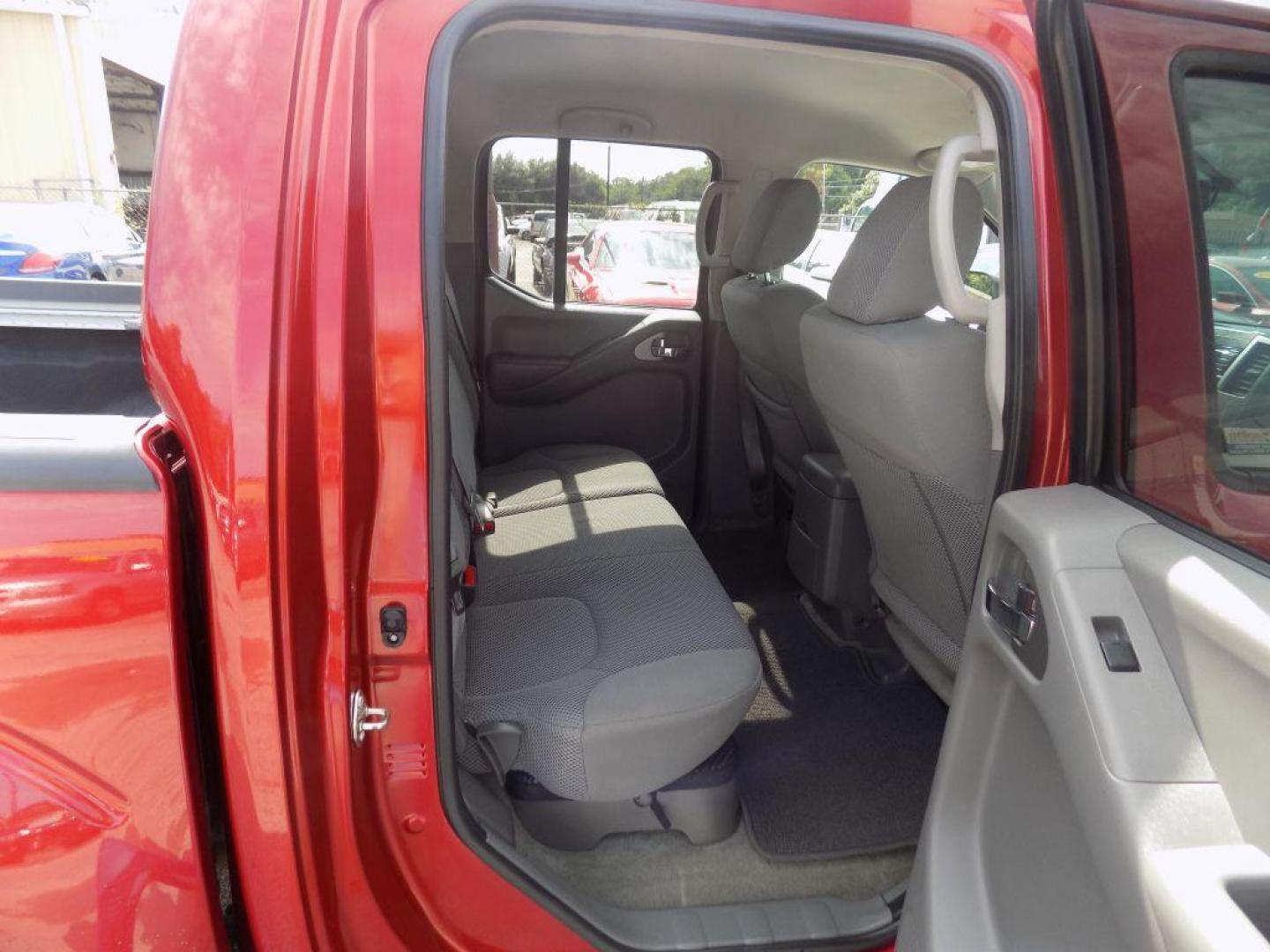 2017 RED NISSAN FRONTIER S (1N6DD0ER9HN) with an 4.0L engine, Automatic transmission, located at 830 E. Canino Rd., Houston, TX, 77037, (281) 405-0440, 38.358219, -81.729942 - Photo#11